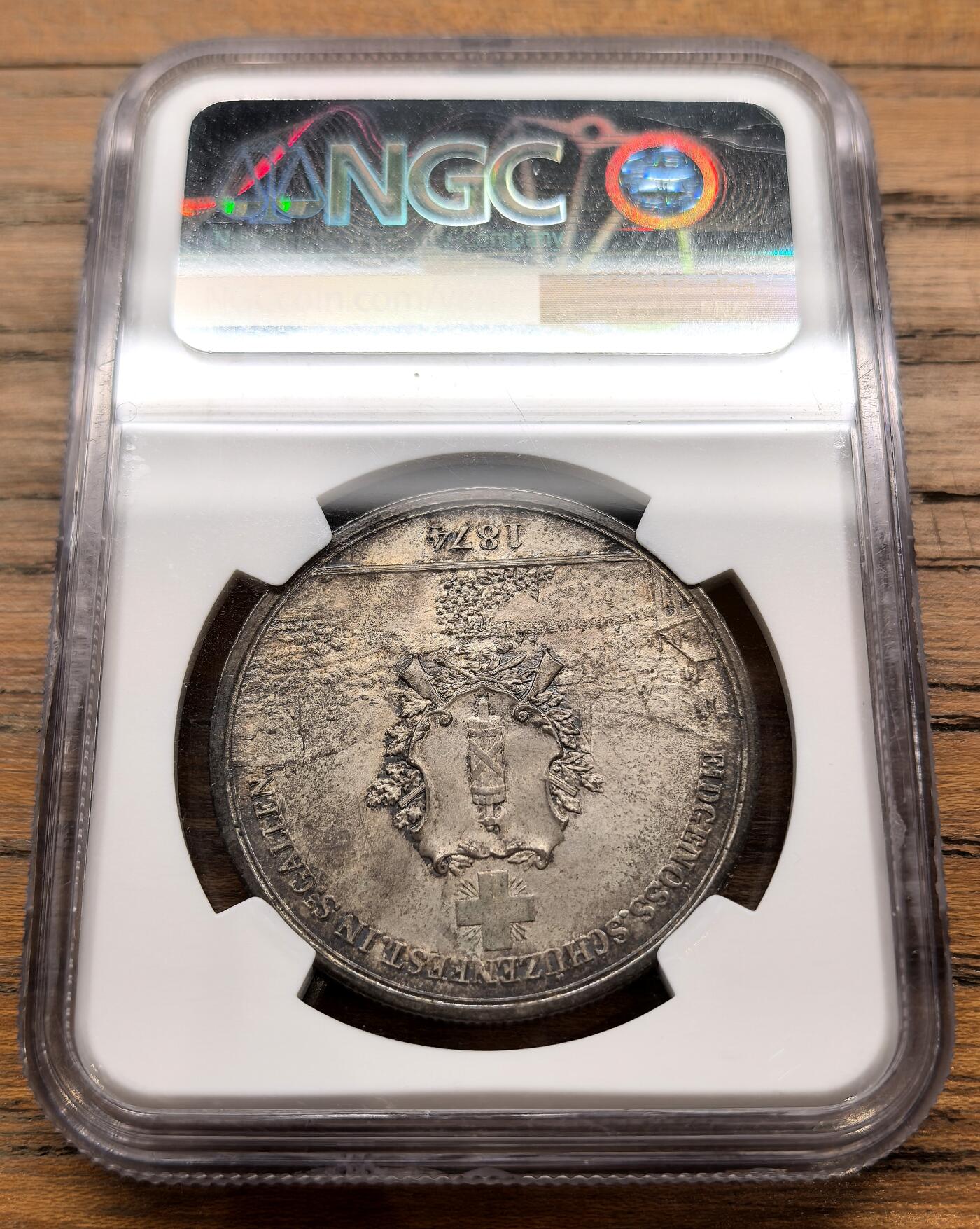 凡希社世界钱币微拍月度大拍（2025/12） 荐！1874瑞士圣加仑射击节5法郎大银NGC-MS63，烟熏香槟金重五彩，视觉感一流，真正的藏家品质！。