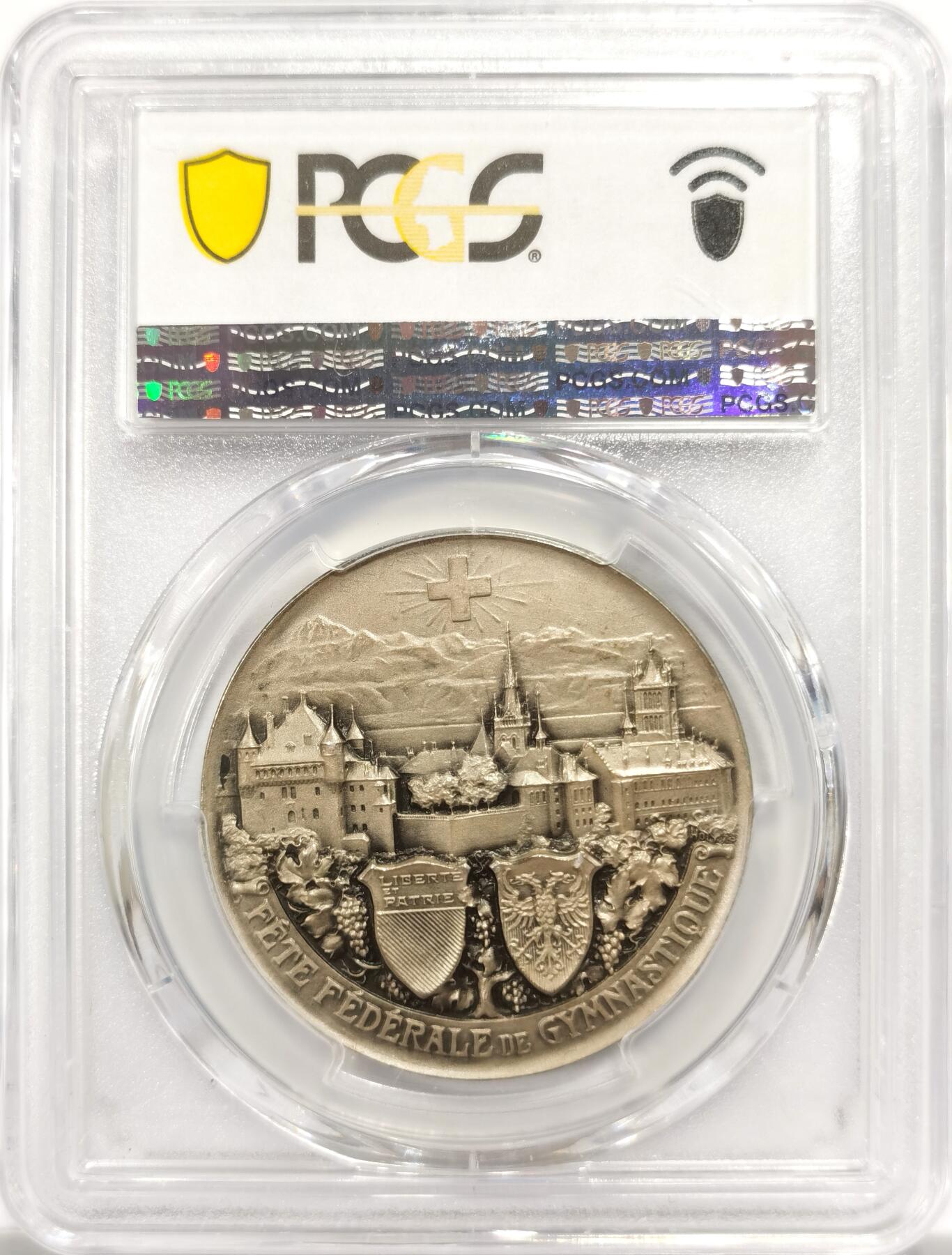 博洋堂世界钱币拍卖第151期（全场包邮） PCGS SP65 冠军分数 1909年瑞士洛桑城市景观纪念银章。国内首见此品种银章 名家Holy Freres制作。此枚做工极为精细，磨砂精制，超高浮雕，城市景观雕刻的纤毫毕现，难以想象这是20世纪的设计和工艺。章中还融合了经典的赫尔维迪亚女神，瑞士本土特色集中展示的一枚