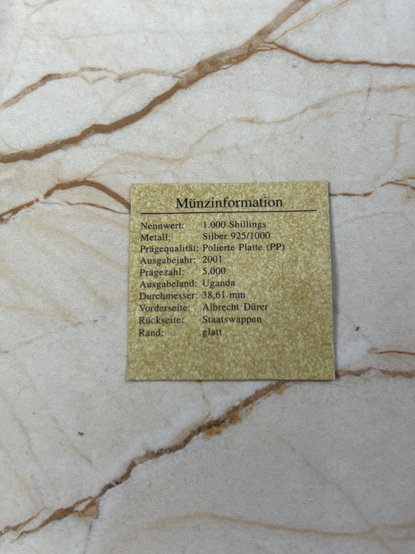 第185期拍卖 乌干达2001年人物丢勒精制纪念银币带证书，925银，20克，发行5000枚【银价266】