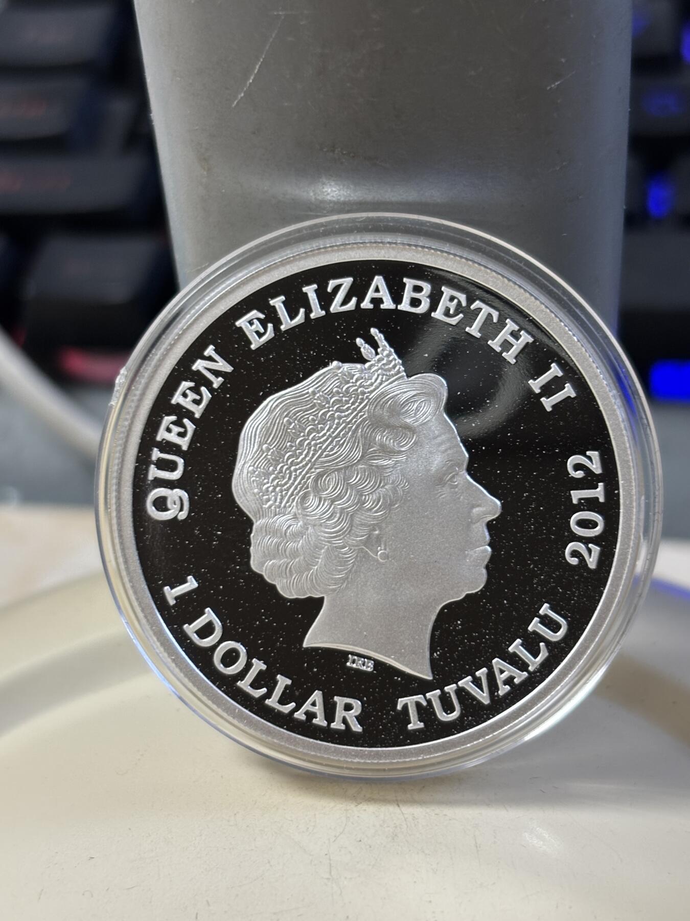 第185期拍卖 图瓦卢2012年龙的传说系列3圣乔治屠龙1盎司彩银币，999银，发行5000枚