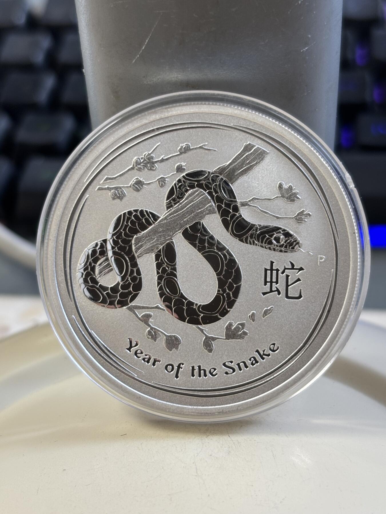 第185期拍卖 澳大利亚2013年十二生肖蛇1盎司纪念银币，999银，塑料盒有瑕疵