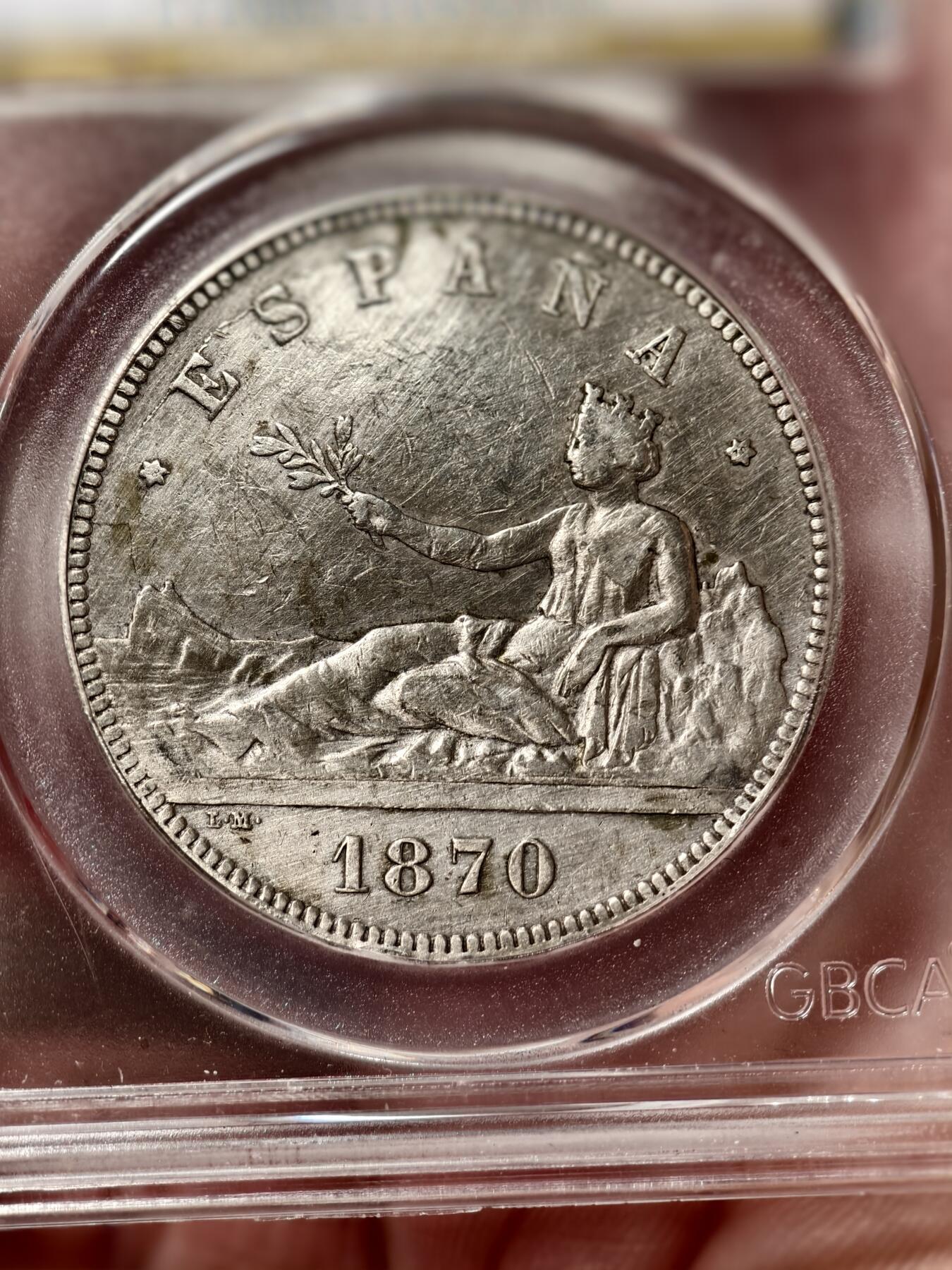 抚柳草堂-首期章牌钱币 限时免佣 满百包邮 放漏专场 1870西班牙5比塞塔拿花双柱 临时政府仅铸1年 公博au50