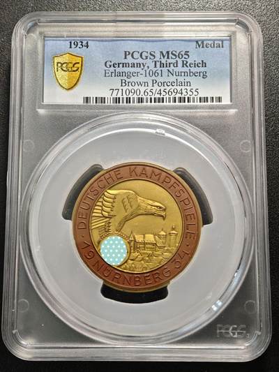 【德藏】世界币章拍卖第156期（拍品征集中~欢迎藏友联系） - 1934年 德国民族社会主义工人党纽伦堡军演陶瓷镀金纪念章 直径约46mm PCGS MS65 亚军分 大盒封装 少见品种！（原图请查询PCGS评级官网）