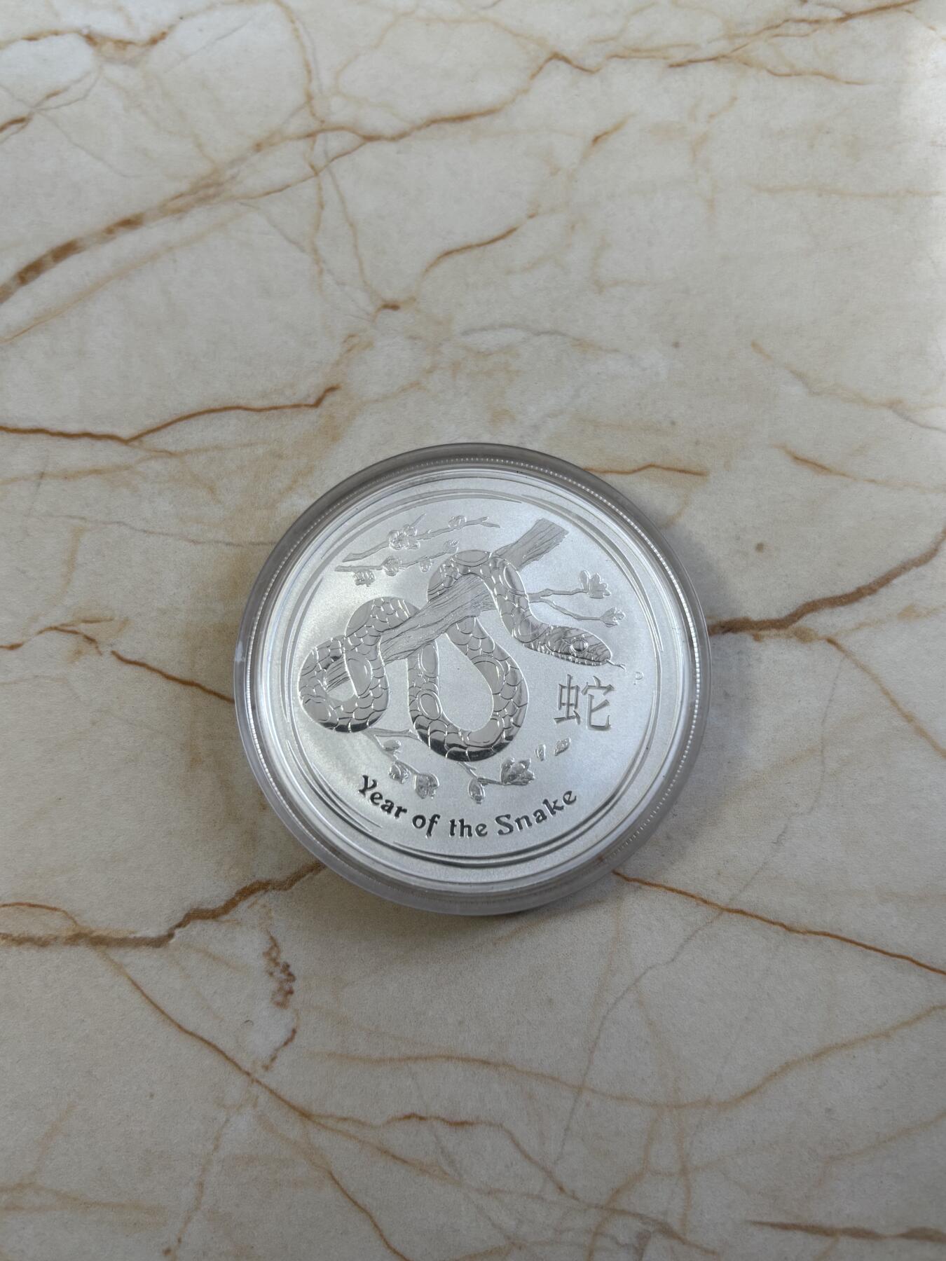 第185期拍卖 澳大利亚2013年十二生肖蛇1盎司纪念银币，999银，塑料盒有瑕疵