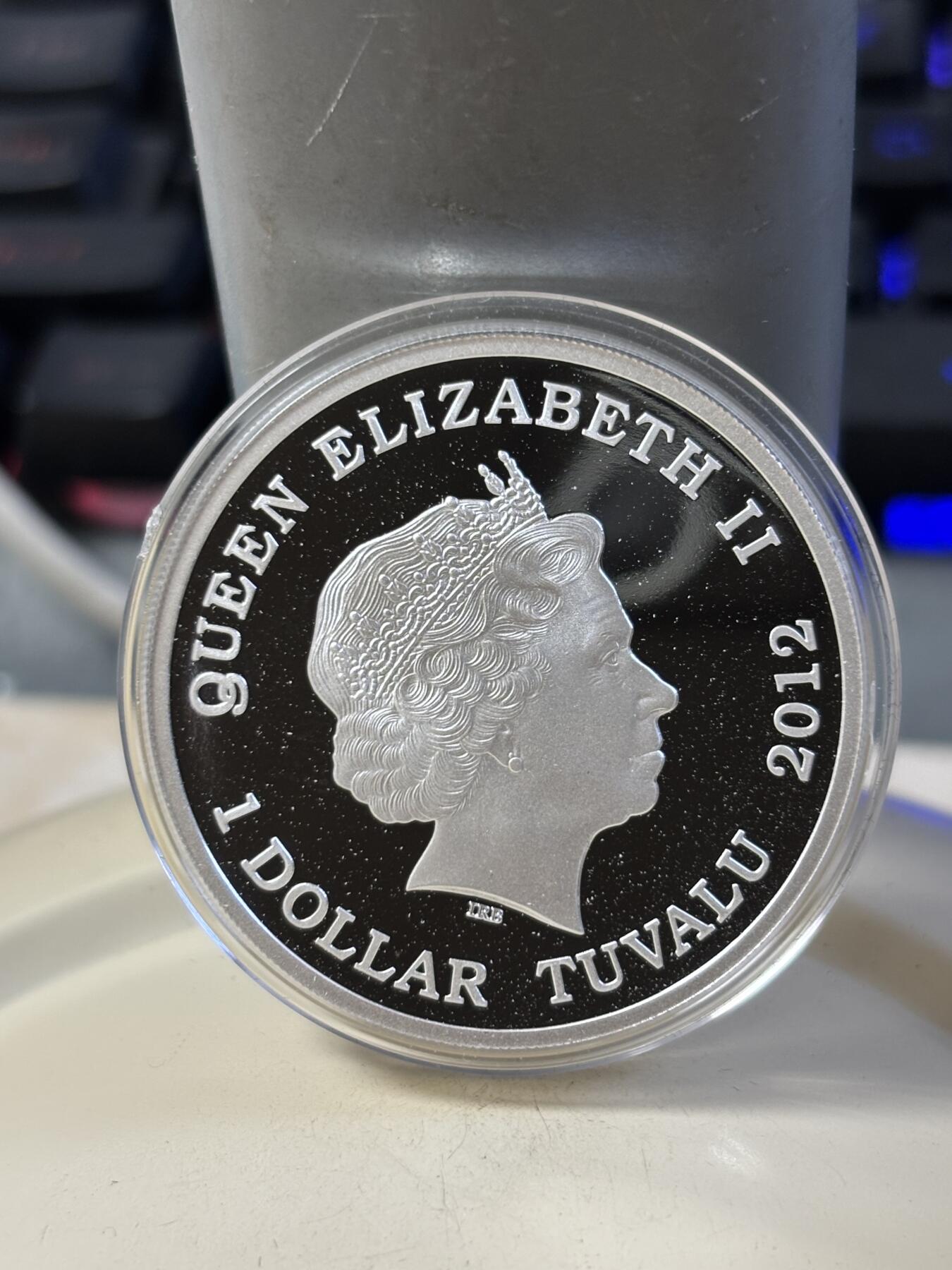 第185期拍卖 图瓦卢2012年龙的传说系列3圣乔治屠龙1盎司彩银币，999银，发行5000枚