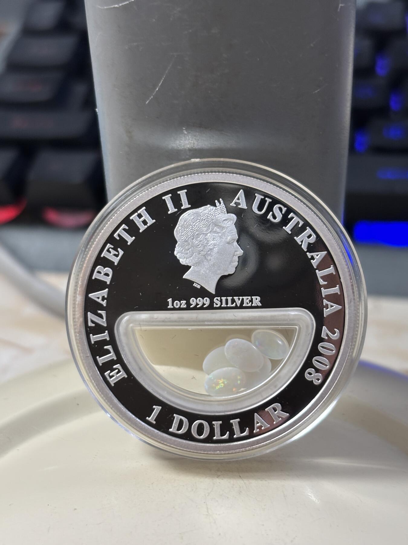 第185期拍卖 澳大利亚2008年澳洲宝藏系列中空镶嵌蛋白石银币，999银，发行7500枚，有氧化