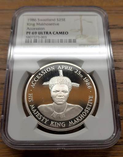 凡希社世界钱币微拍月度大拍（2025/12） - 1986斯威士兰国王与王后25E大银精铸NGC-PF69UC