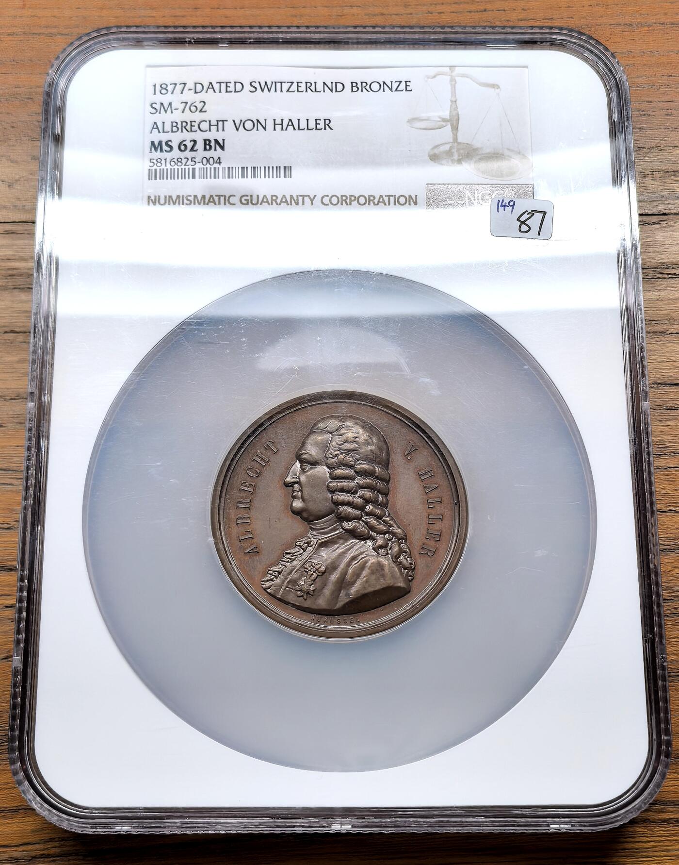 凡希社世界钱币微拍月度大拍（2025/12） 1877瑞士生理学家阿尔布雷希特·冯·哈勒逝世百年纪念铜章NGC-MS62，瑞士杰出的生理学家，被公认为是十八世纪第一流生物学家和实验生理学之父，被称为“近代生理学之父”，他花费十年时间，撰写成八卷本的《生理学纲要》，这一著作被认为具有医学史上的里程碑的重要意义。铜色温润优美，人物雕刻精湛。