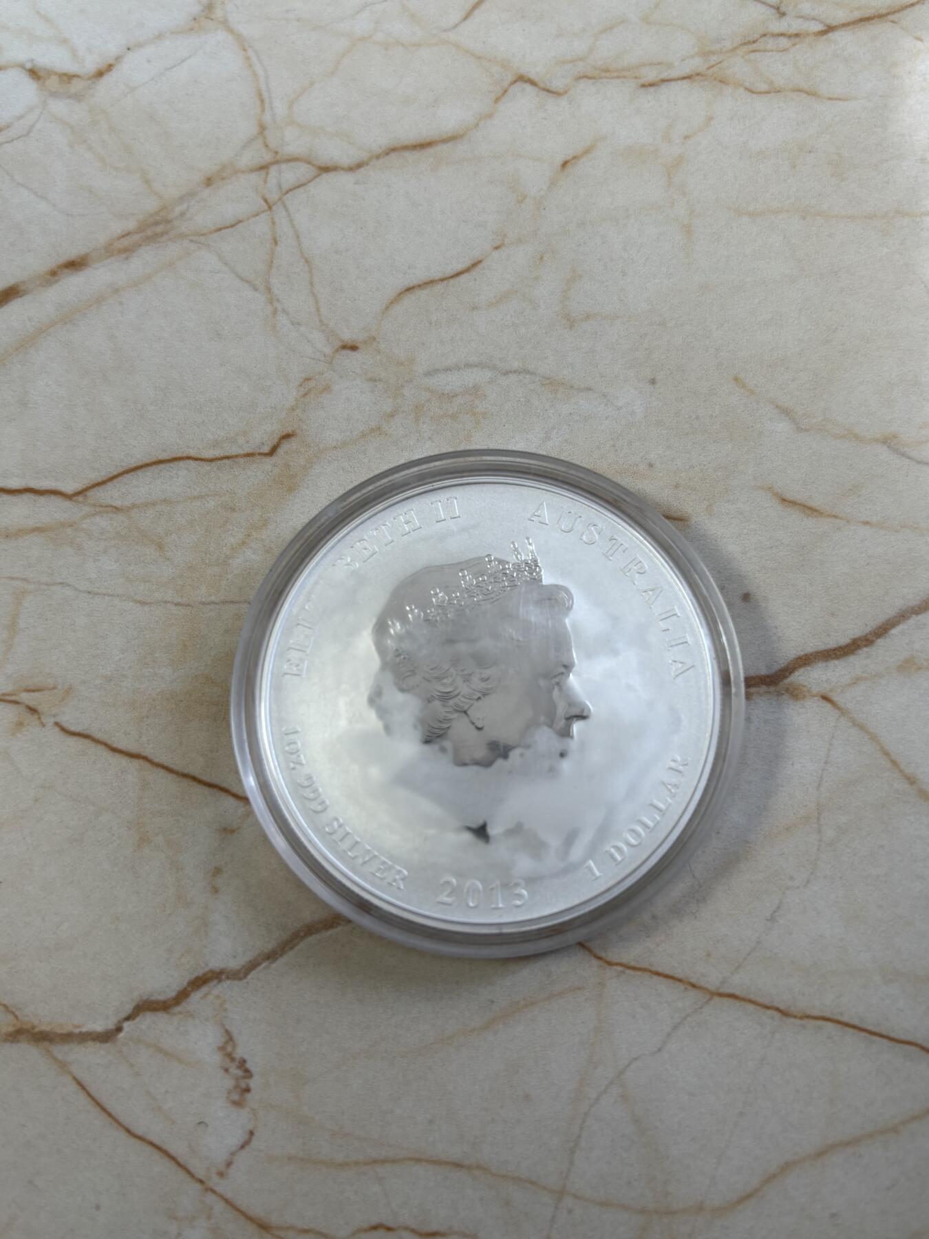 第185期拍卖 澳大利亚2013年十二生肖蛇1盎司纪念银币，999银，塑料盒有瑕疵