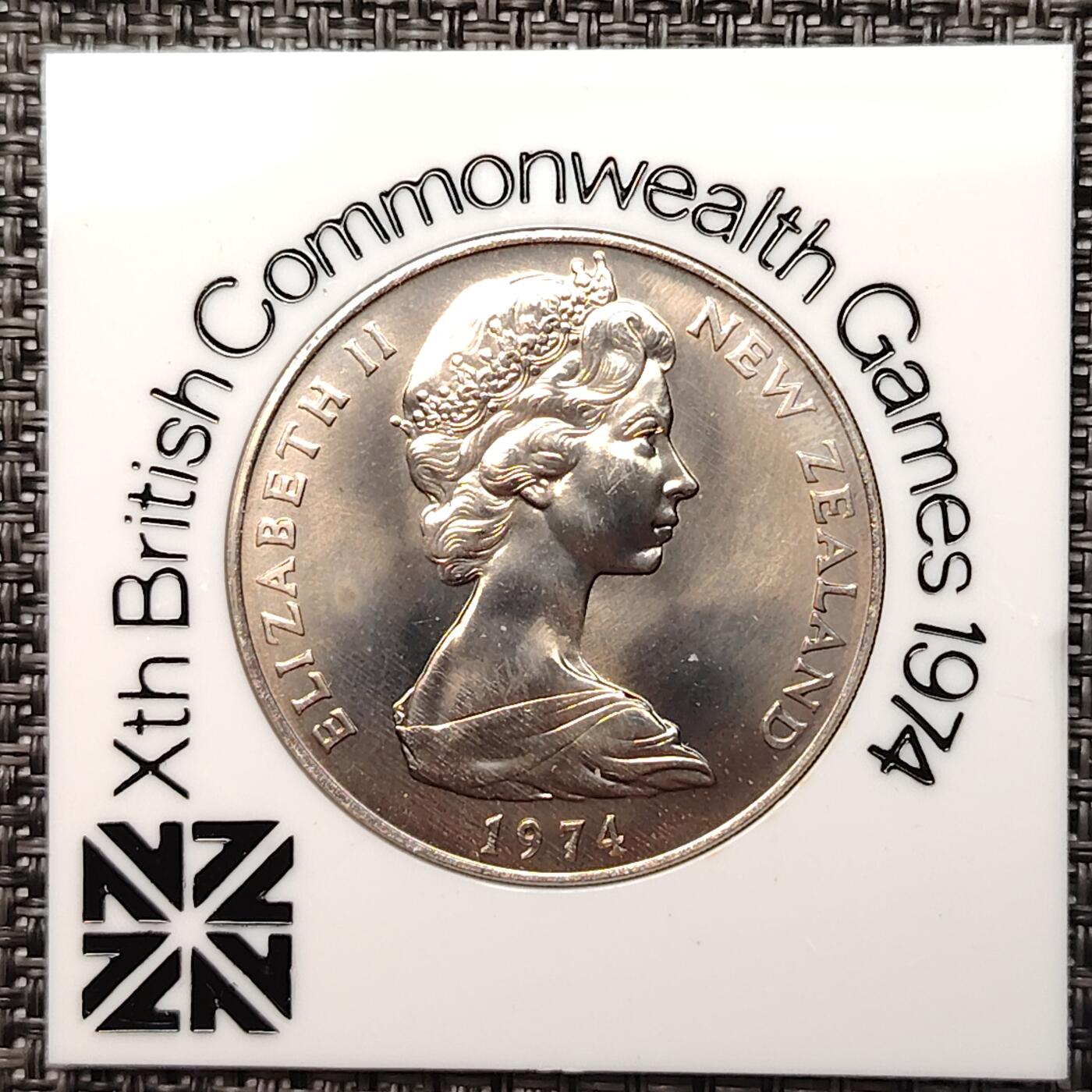 布加迪🐬～世界钱币(上海)🌾第 264 期 /  各国套币和散币 新西兰🇳🇿 1974年 1元 英联邦运动会纪念币