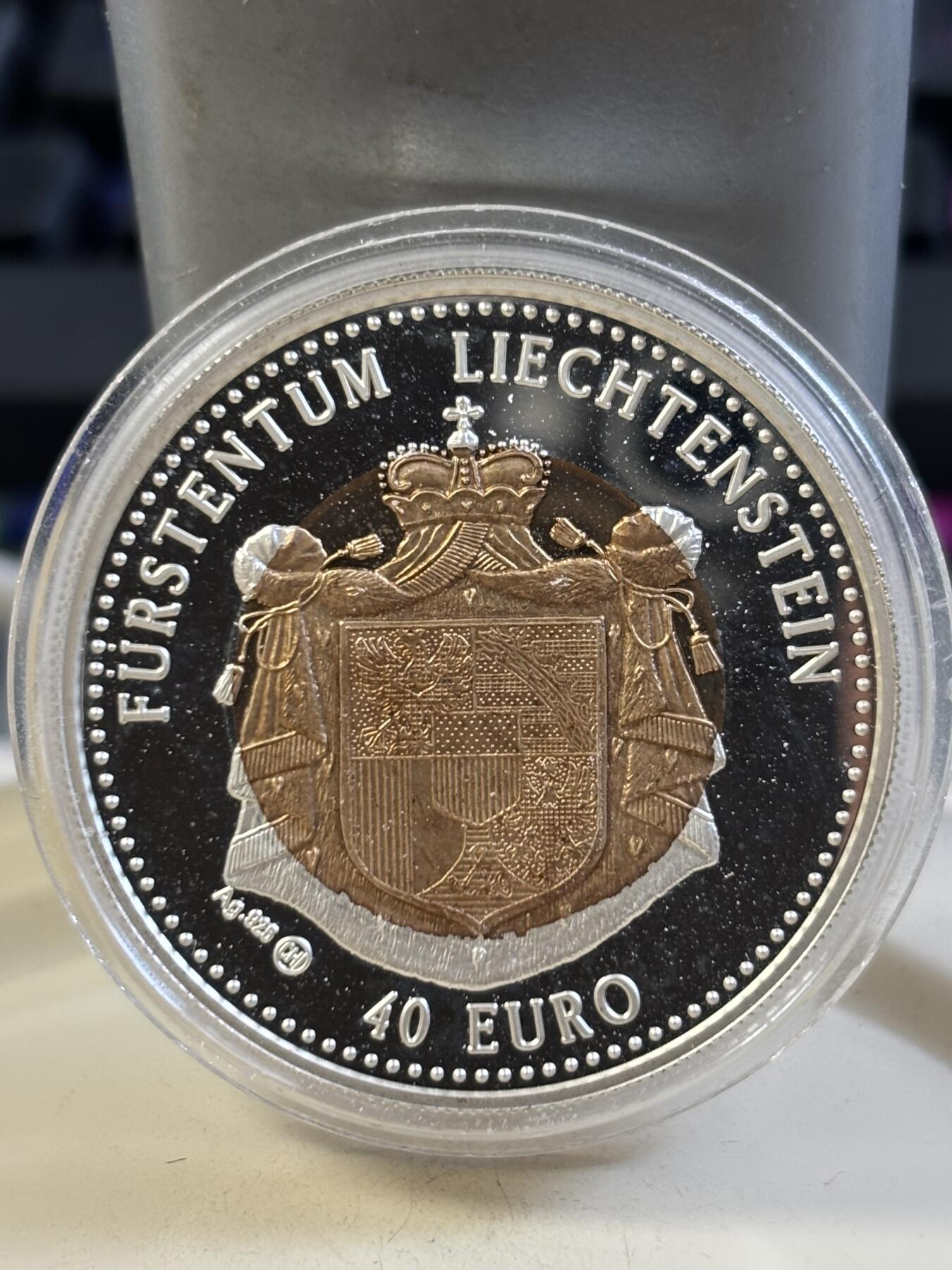 第185期拍卖 列支敦士登1996年黄金马车双色加厚精制纪念银币，925银镀金，46克，发行500枚，有氧化