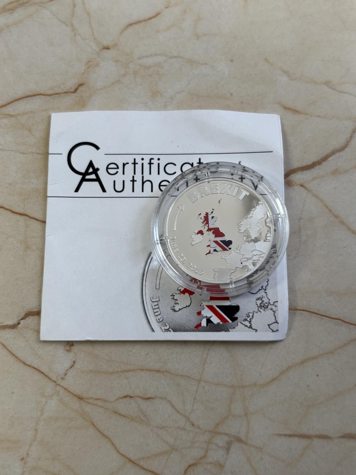 第185期拍卖 库克2016年脱欧彩色纪念银币带证书，999银，3克，发行2016枚