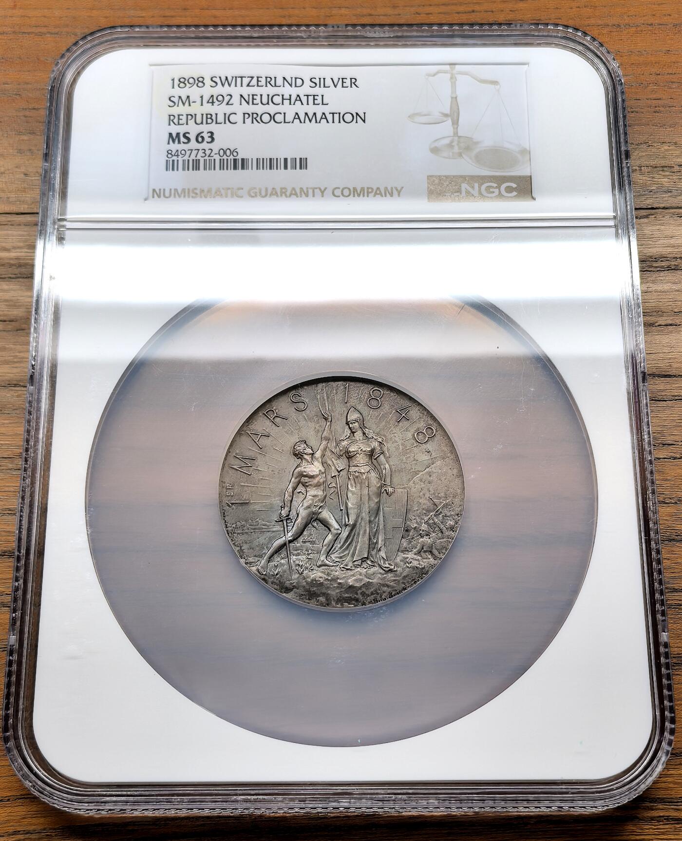 凡希社世界钱币微拍月度大拍（2025/12） 1898瑞士纳沙泰尔共和国成立宣言50周年纪念银章NGC-MS63，曾经是亲普鲁士的一个公国和瑞士联邦的一个州，于1848年3月1日宣布成立共和国。艺术性极佳的瑞士邦国章。