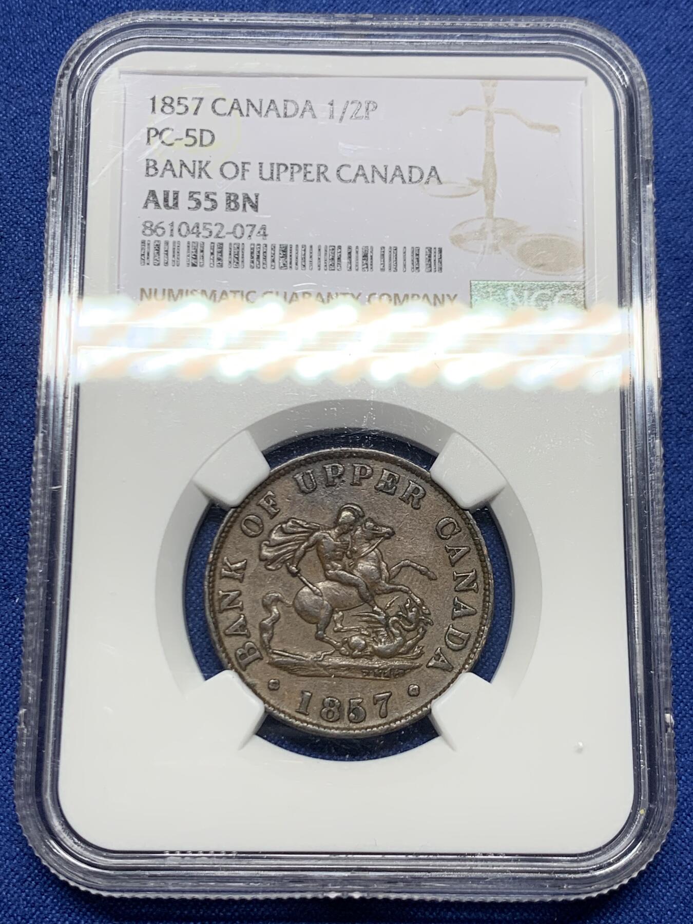 《竞宝斋》第447场 周日，周一，2场连拍 （全场包邮） NGC AU55BN 上加拿大1857半便士银行token，经典马剑设计，这个品种上AU都非常难，铜币爱好者必选