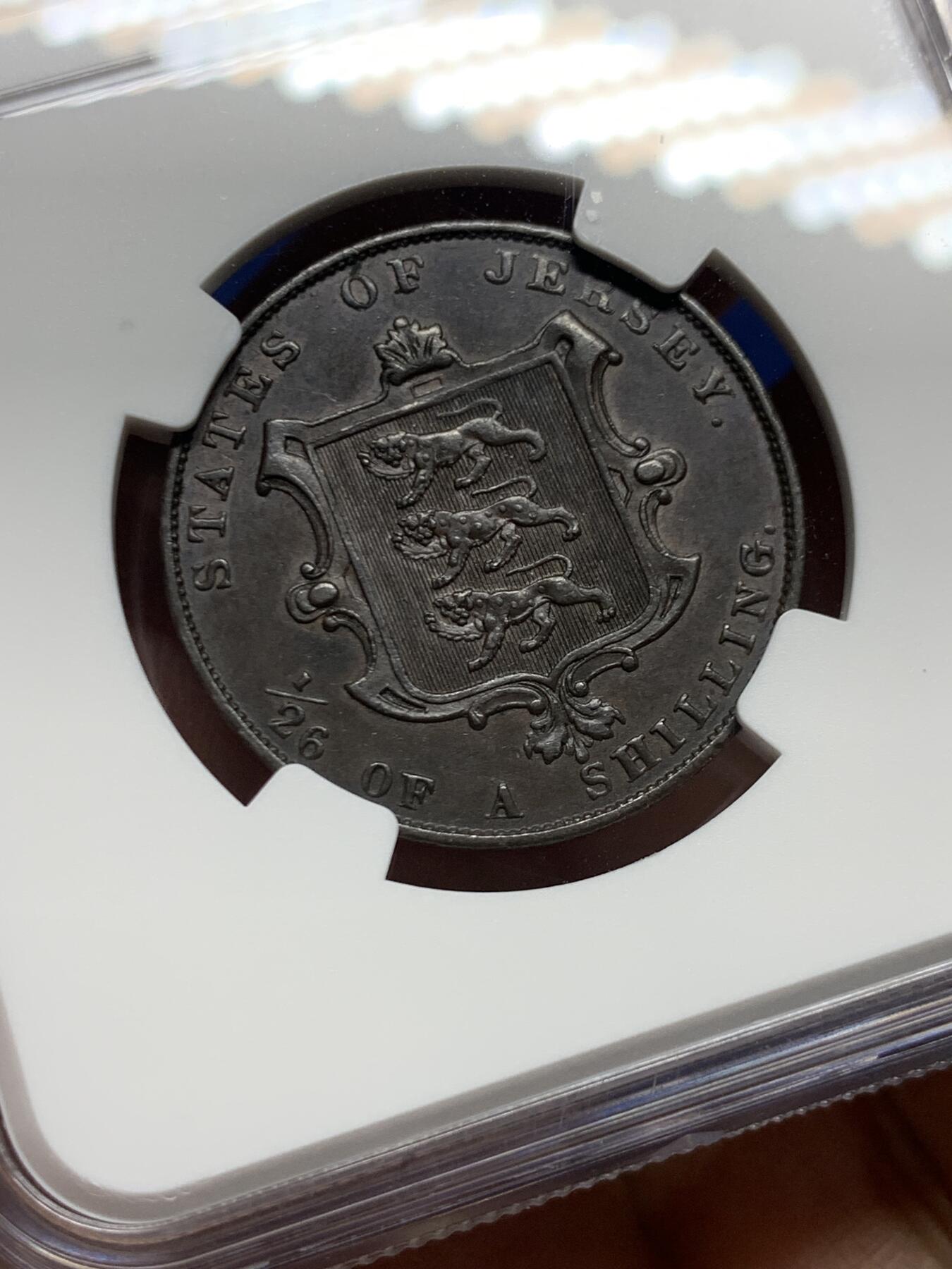 《竞宝斋》第447场 周日，周一，2场连拍 （全场包邮） NGC AU58BN 英属泽西岛1861年1/26先令铜币，后期小维头像，细节良好，巧克力包浆