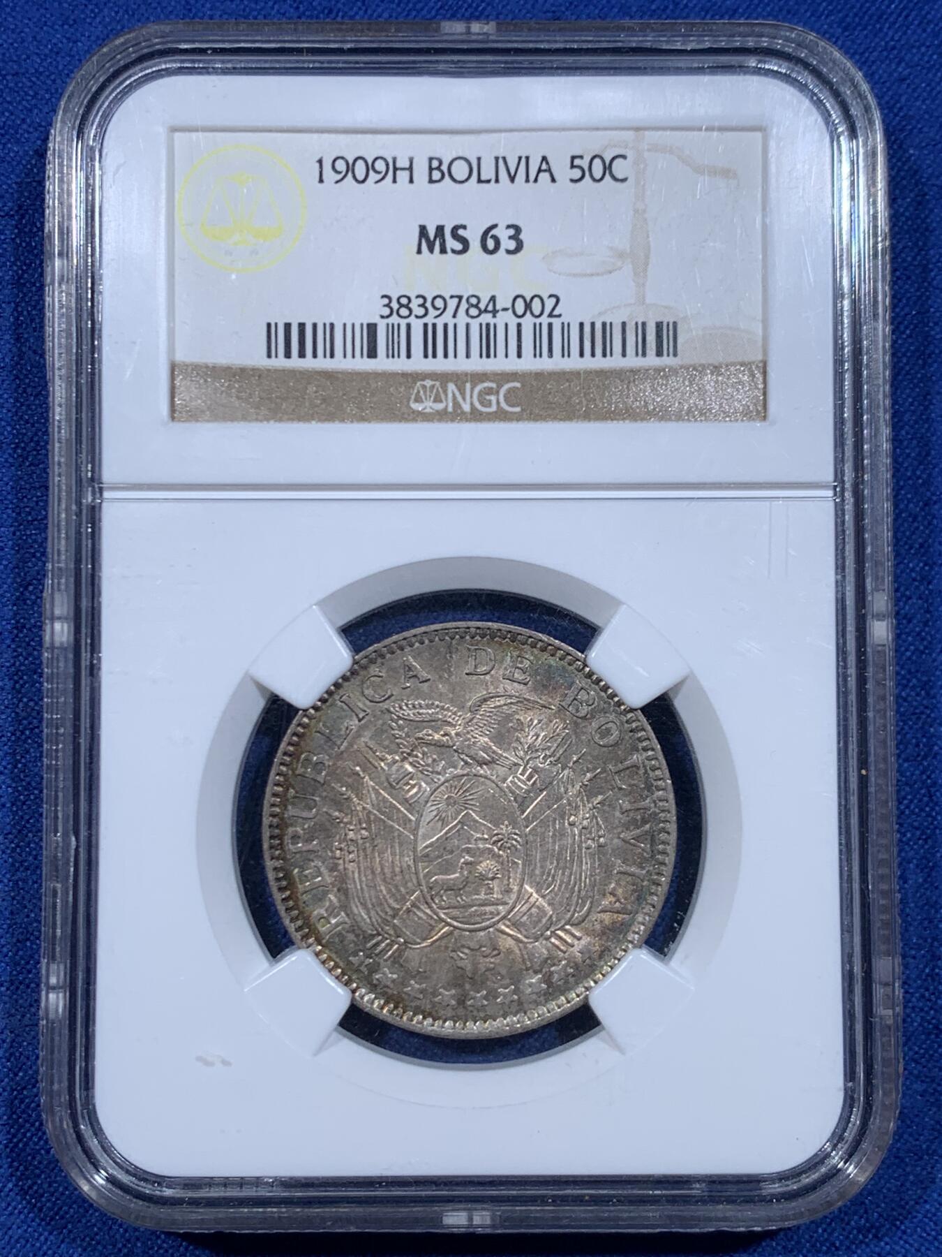 《竞宝斋》第447场 周日，周一，2场连拍 （全场包邮） NGC MS63 玻利维亚 1909年 50分 银币 双面五彩包浆 非常有意思的南美洲设计