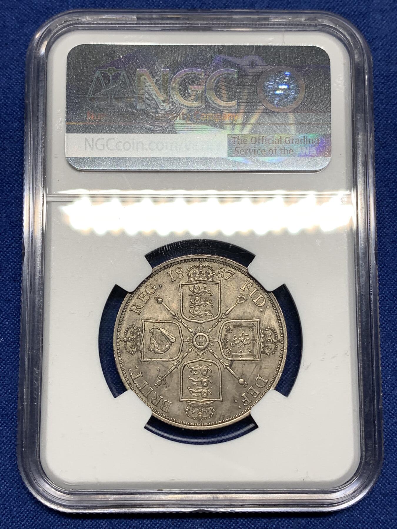 《竞宝斋》第447场 周日，周一，2场连拍 （全场包邮） NGC AU58 英国1887弗洛林银币，经典英伦包浆，略有低评。