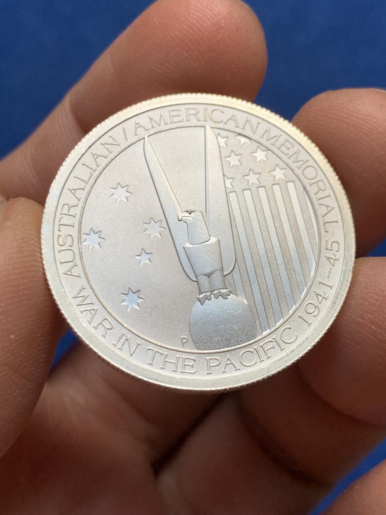 《竞宝斋》第447场 周日，周一，2场连拍 （全场包邮） 澳大利亚2013年“太平洋战争70周年”1/2盎司纪念银币（15.55克 999银）