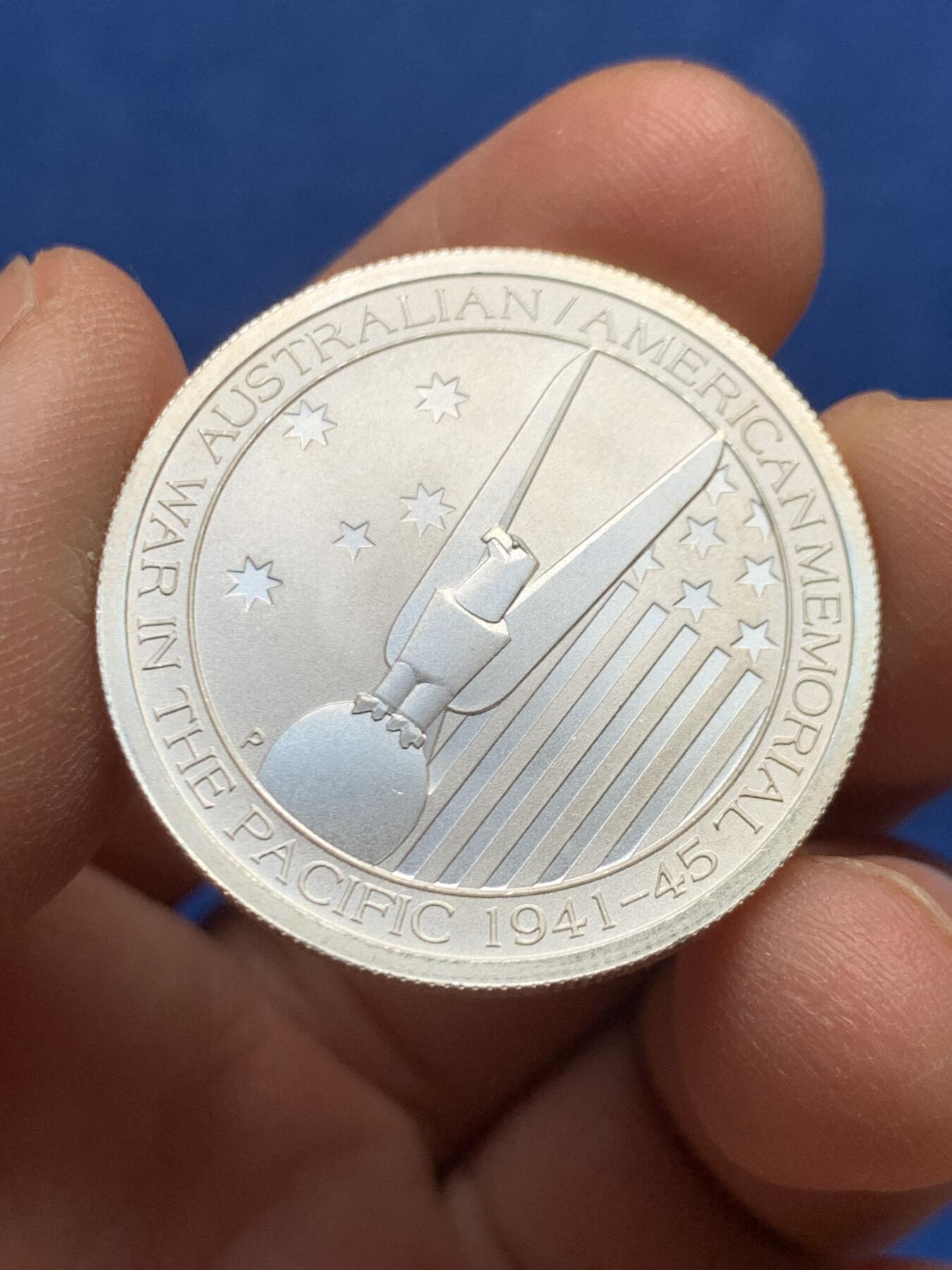 《竞宝斋》第447场 周日，周一，2场连拍 （全场包邮） 澳大利亚2013年“太平洋战争70周年”1/2盎司纪念银币（15.55克 999银）