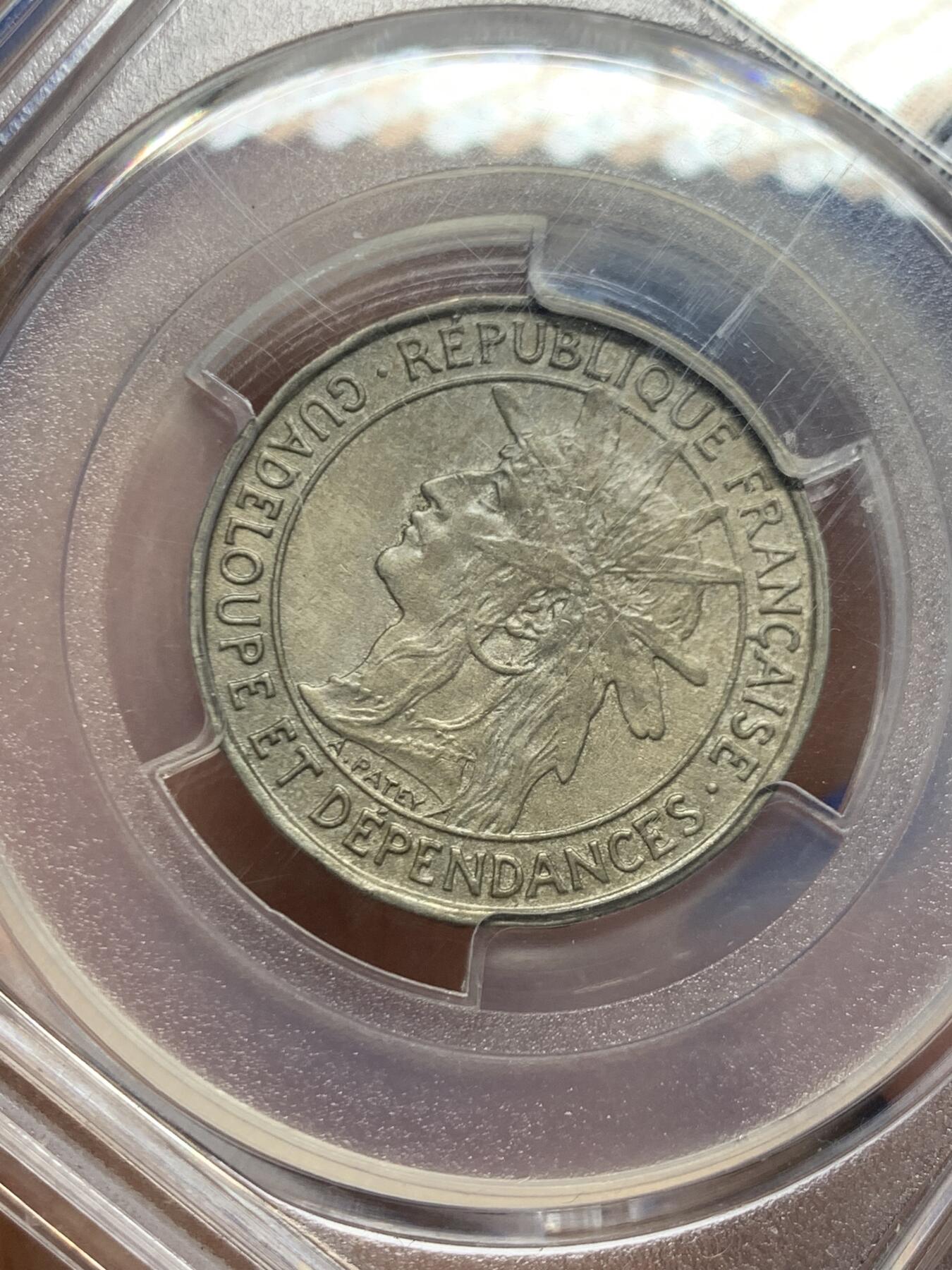 《竞宝斋》第447场 周日，周一，2场连拍 （全场包邮） PCGS AUD 瓜德罗普1921年1法郎，少见法属殖民地品种，经典女神形象，值得拥有。