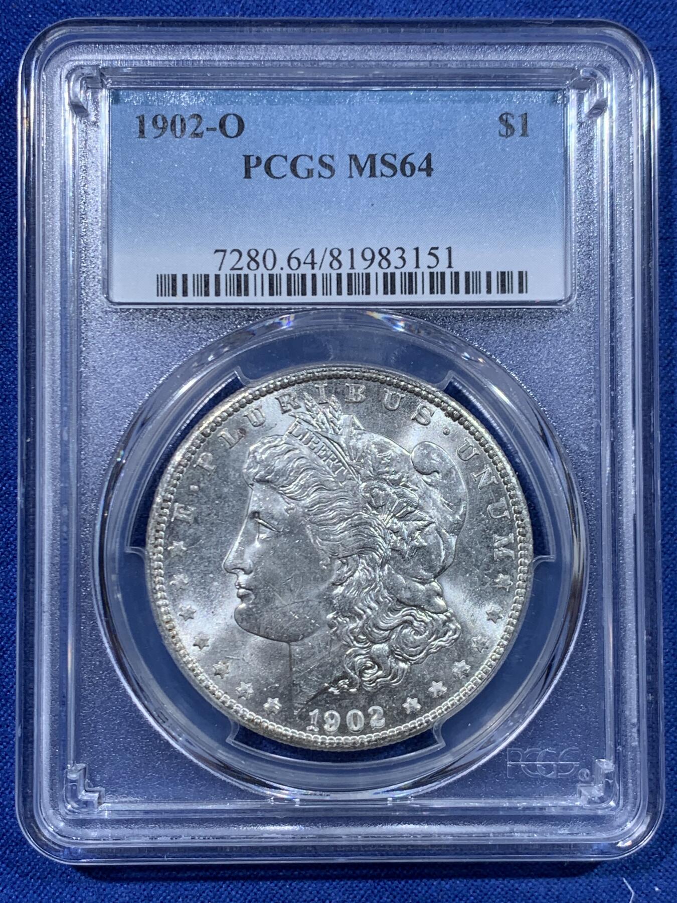 《竞宝斋》第447场 周日，周一，2场连拍 （全场包邮） PCGS MS64 美国1902年O版摩根一美元银币 早期标签 转光漂亮 支撑小磕 细节见图