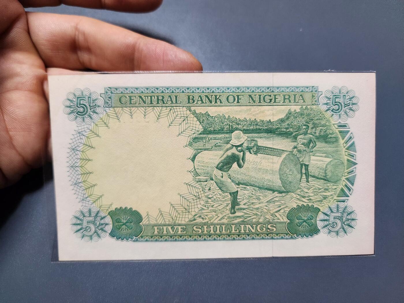 12月13号晚上8点 外国纸币自动截拍第72场 尼日利亚 1968年5先令  近新 稀少早期英镑制