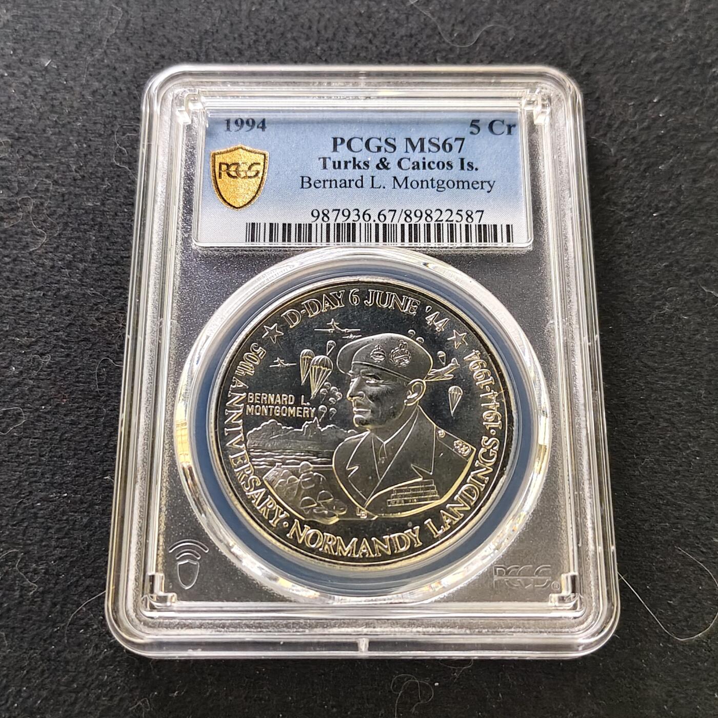 【全场包邮】纯粹捡漏拍487场（免费代拍第24场） 【收藏级·冠军分】特克斯和凯克斯群岛1994年5克朗D-DAY日50周年蒙哥马利精制纪念币-PCGS MS67