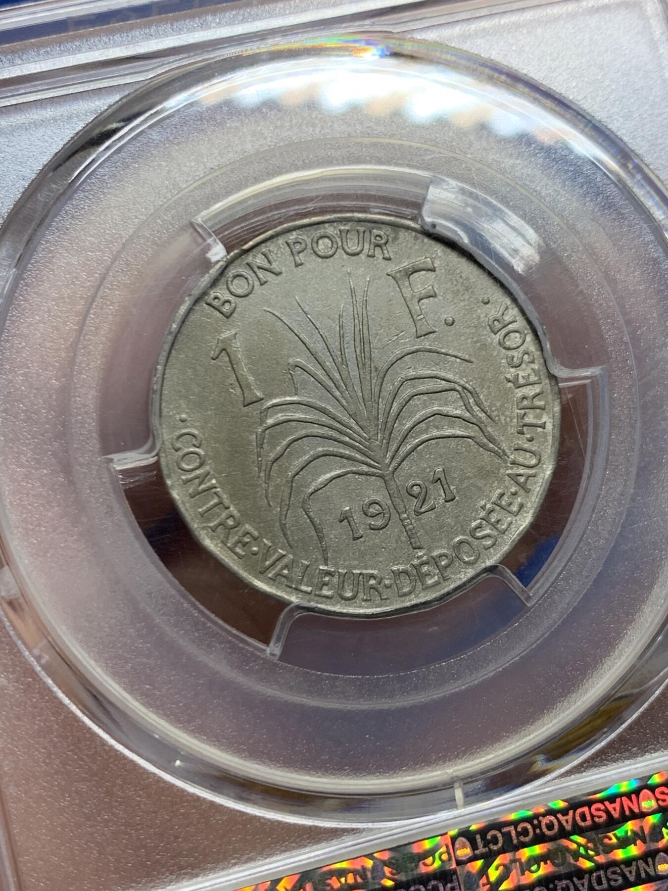 《竞宝斋》第447场 周日，周一，2场连拍 （全场包邮） PCGS AUD 瓜德罗普1921年1法郎，少见法属殖民地品种，经典女神形象，值得拥有。