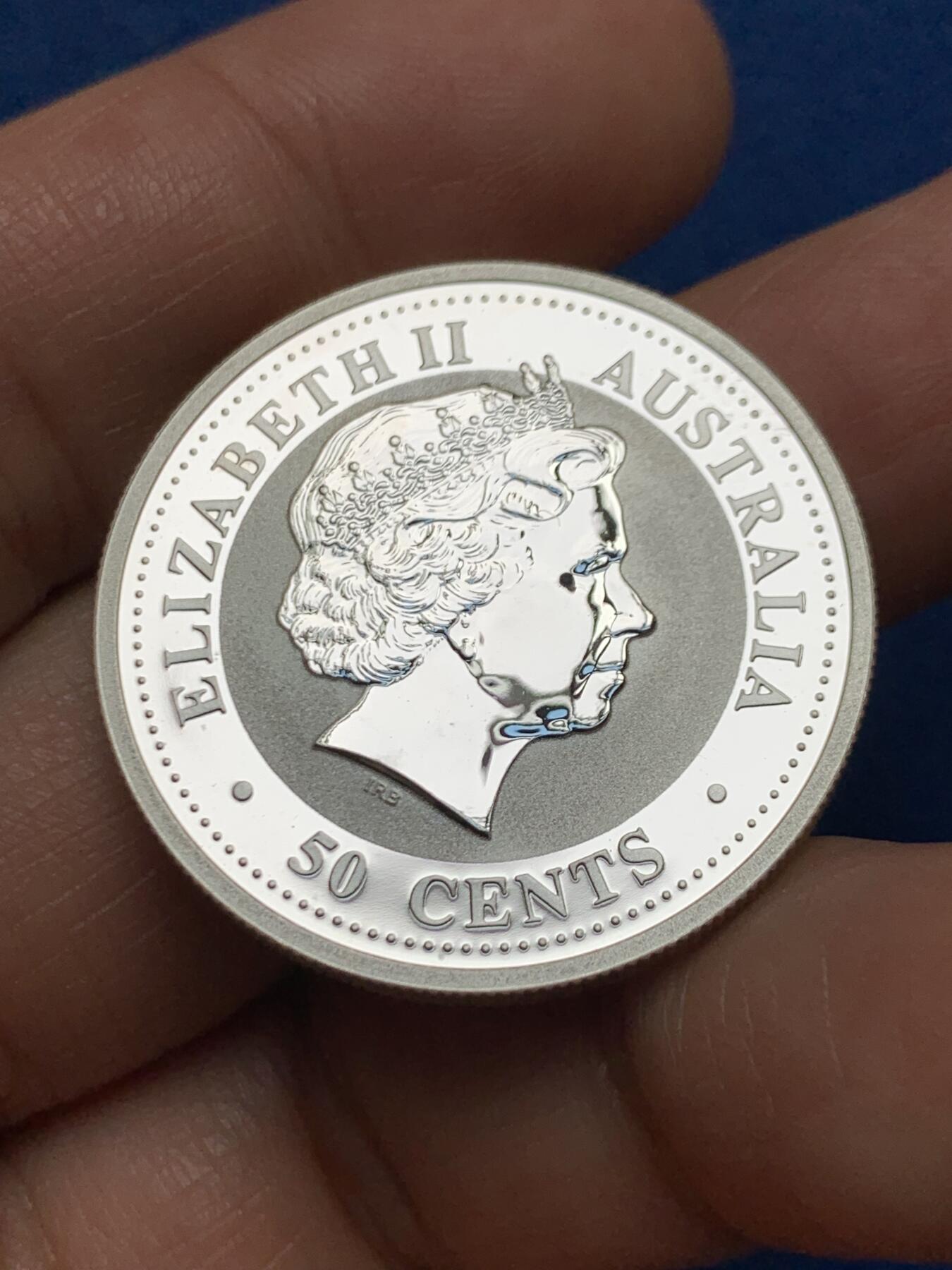 《竞宝斋》第447场 周日，周一，2场连拍 （全场包邮） 澳大利亚皇家造币厂 伊丽莎白50分干禧年龙纪念银币 1/2盎司 999纯银