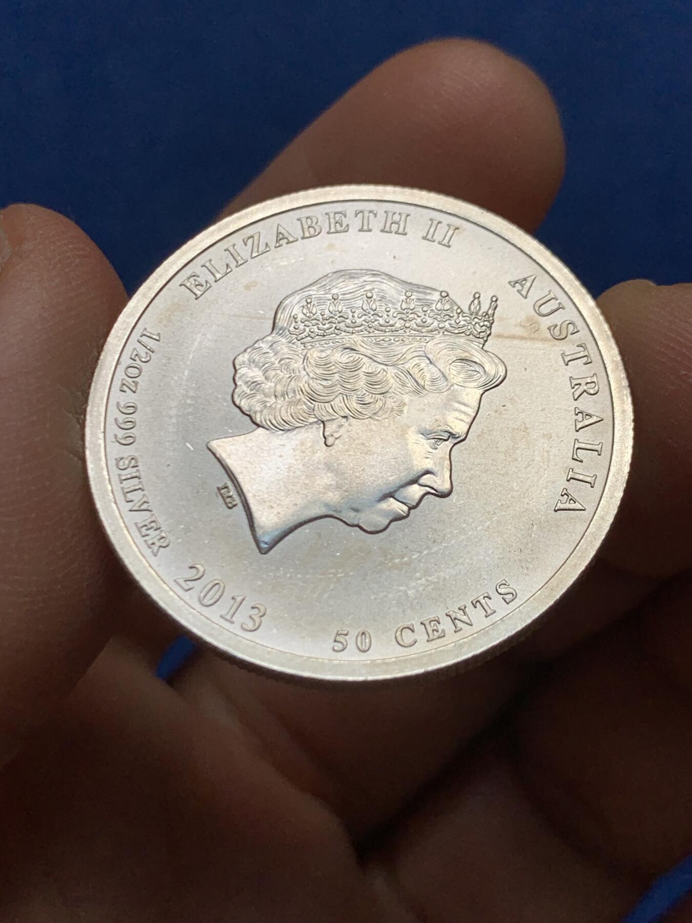 《竞宝斋》第447场 周日，周一，2场连拍 （全场包邮） 澳大利亚2013年“太平洋战争70周年”1/2盎司纪念银币（15.55克 999银）