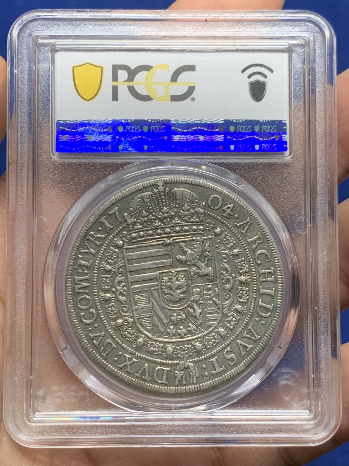 《竞宝斋》第447场 周日，周一，2场连拍 （全场包邮） PCGS AU55 奥地利帝国蒂罗尔州1704/3年骑字版利奥波德一世泰勒大银币 哈尔厂铸造 不多见的品种 大披发地包天造型 值得入手