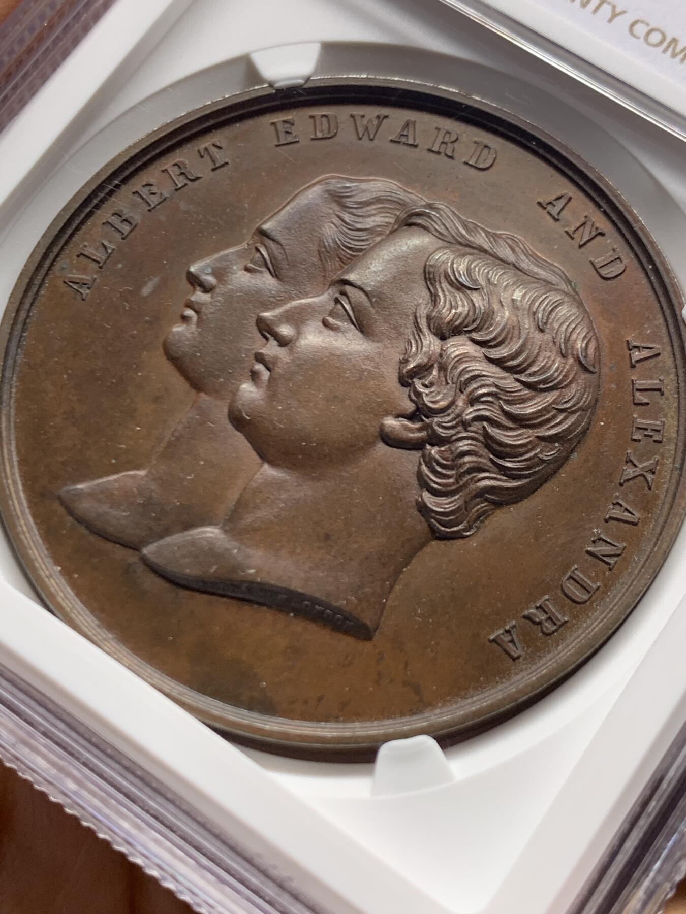 《竞宝斋》第447场 周日，周一，2场连拍 （全场包邮） NGC MS63BN 英国1863年亚历山大公主与阿尔伯特结婚铜章，不错的品种，欢迎收藏。加厚盒