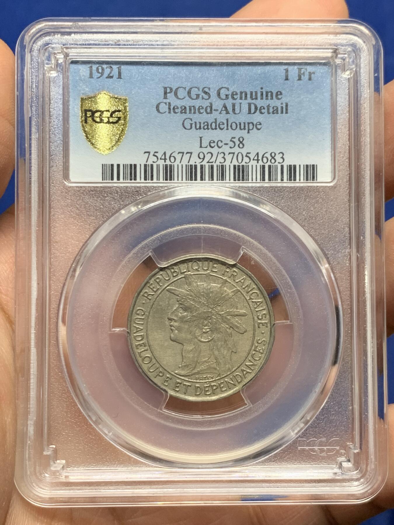 《竞宝斋》第447场 周日，周一，2场连拍 （全场包邮） PCGS AUD 瓜德罗普1921年1法郎，少见法属殖民地品种，经典女神形象，值得拥有。