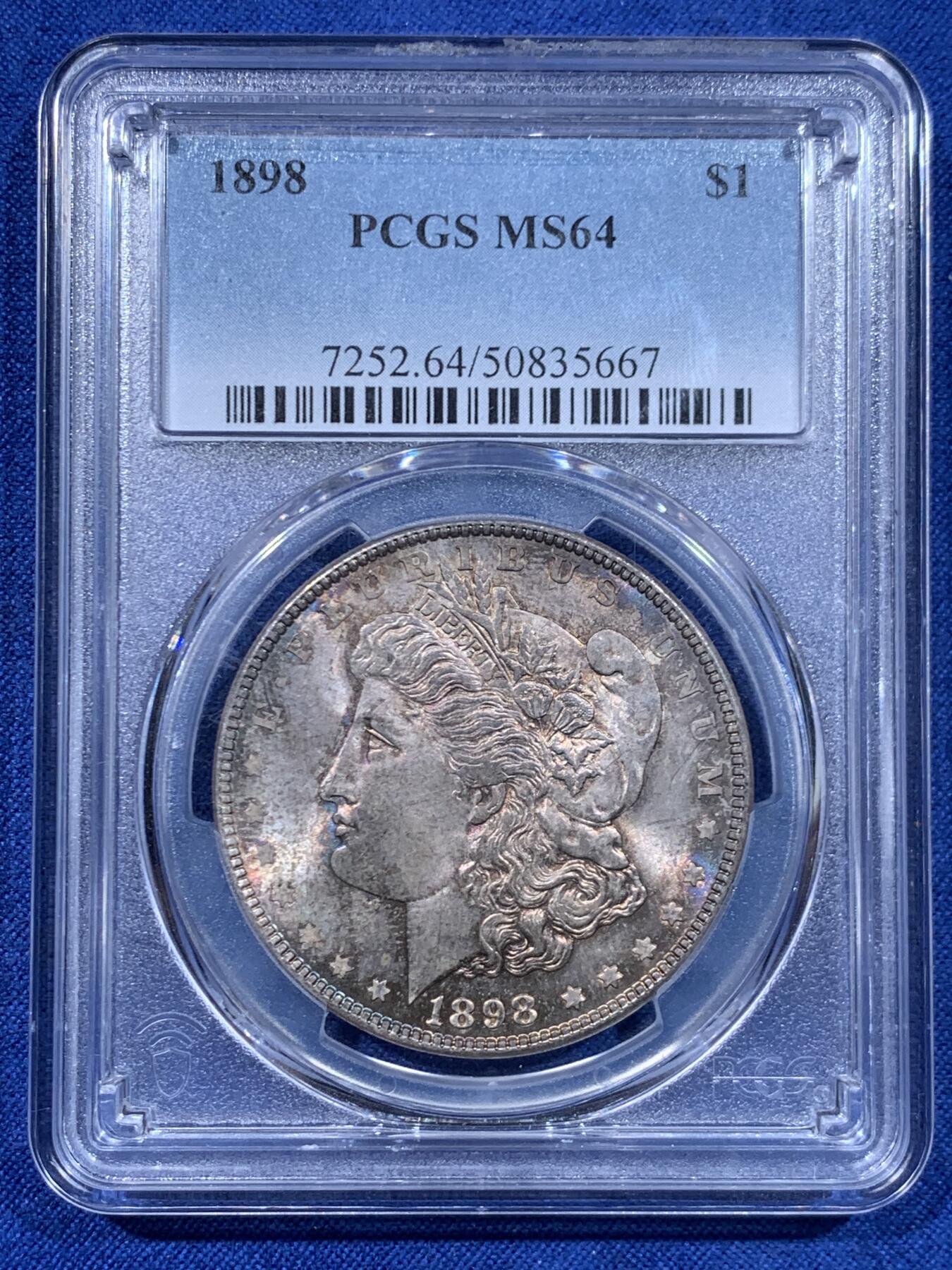 《竞宝斋》第447场 周日，周一，2场连拍 （全场包邮） PCGS MS64 美国 1898年 摩根银币 淡蓝紫色包浆，观感舒适养眼，少见