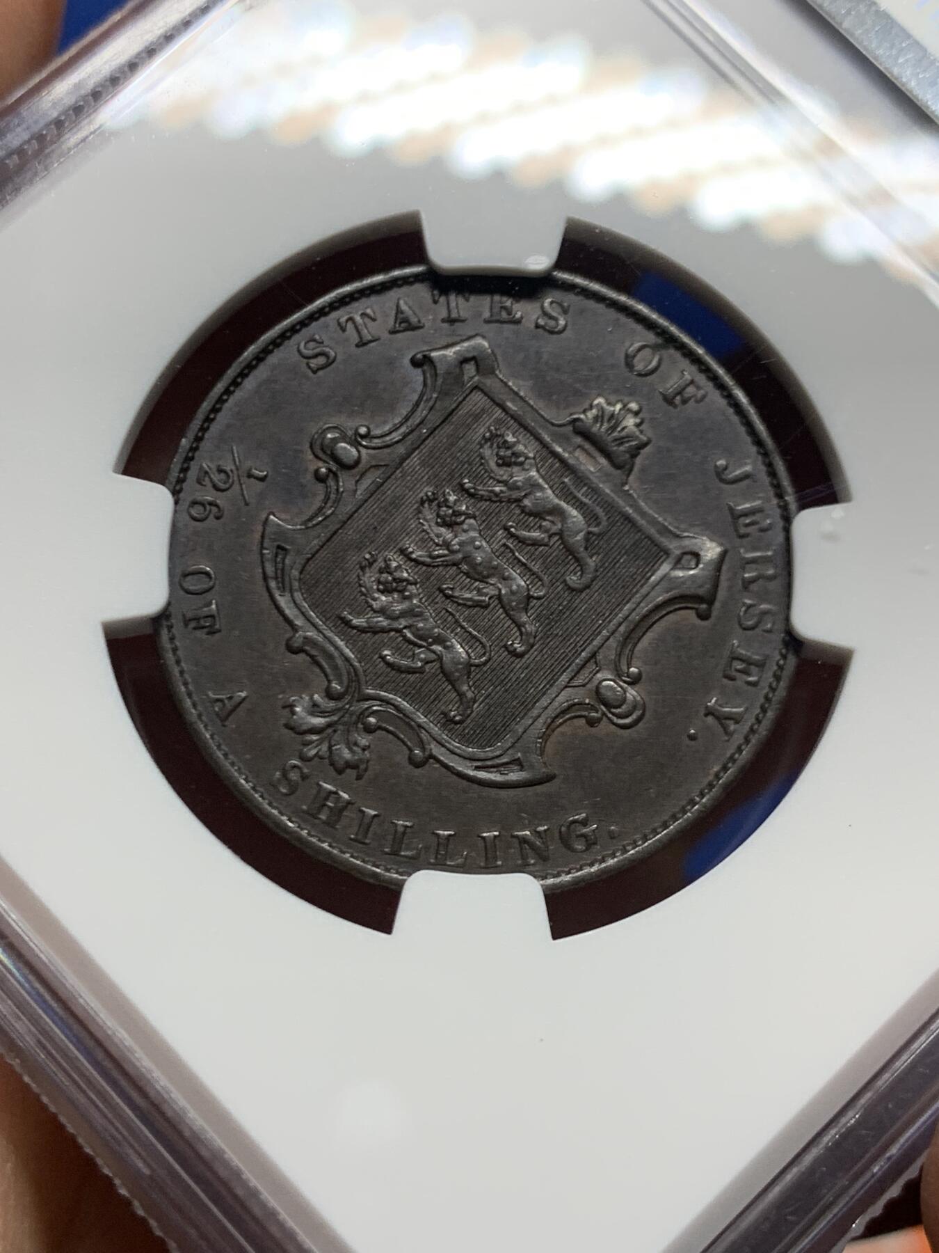 《竞宝斋》第447场 周日，周一，2场连拍 （全场包邮） NGC AU58BN 英属泽西岛1861年1/26先令铜币，后期小维头像，细节良好，巧克力包浆