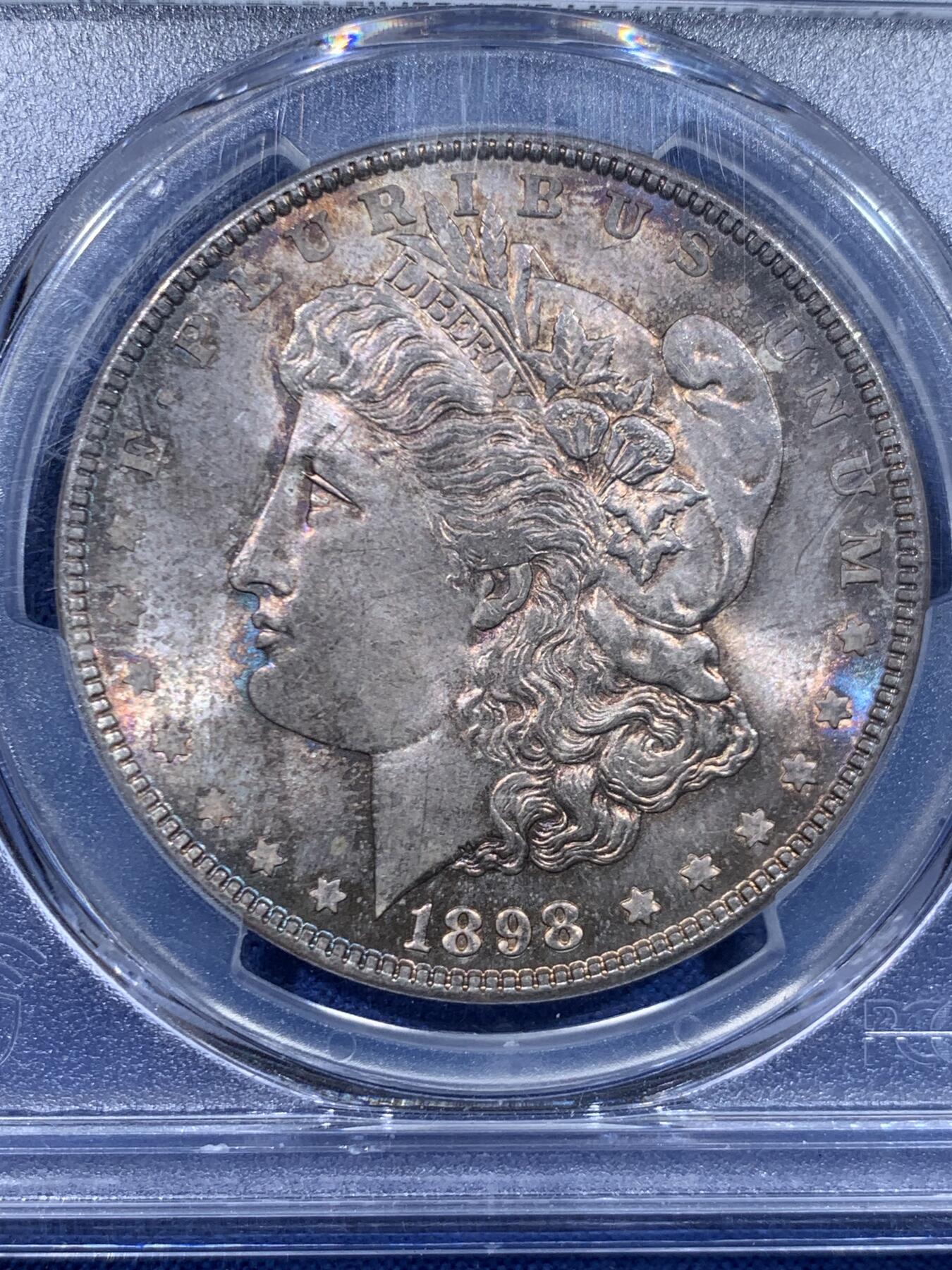 《竞宝斋》第447场 周日，周一，2场连拍 （全场包邮） PCGS MS64 美国 1898年 摩根银币 淡蓝紫色包浆，观感舒适养眼，少见
