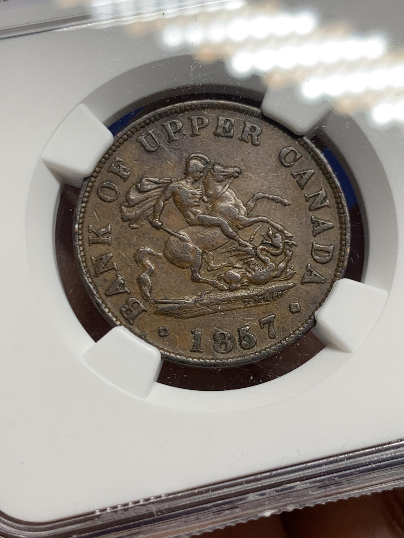 《竞宝斋》第447场 周日，周一，2场连拍 （全场包邮） NGC AU55BN 上加拿大1857半便士银行token，经典马剑设计，这个品种上AU都非常难，铜币爱好者必选