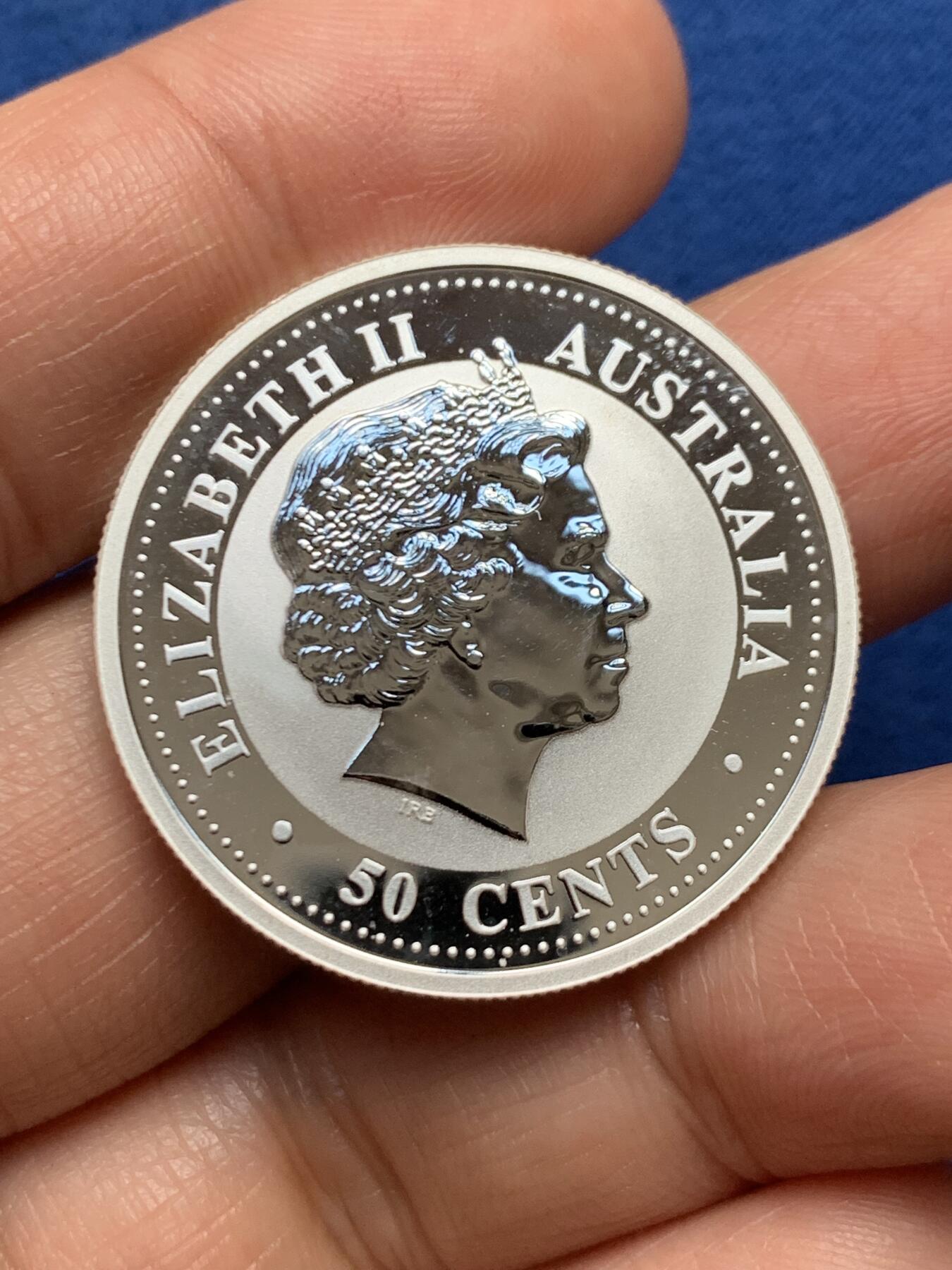 《竞宝斋》第447场 周日，周一，2场连拍 （全场包邮） 澳大利亚皇家造币厂 伊丽莎白50分干禧年龙纪念银币 1/2盎司 999纯银