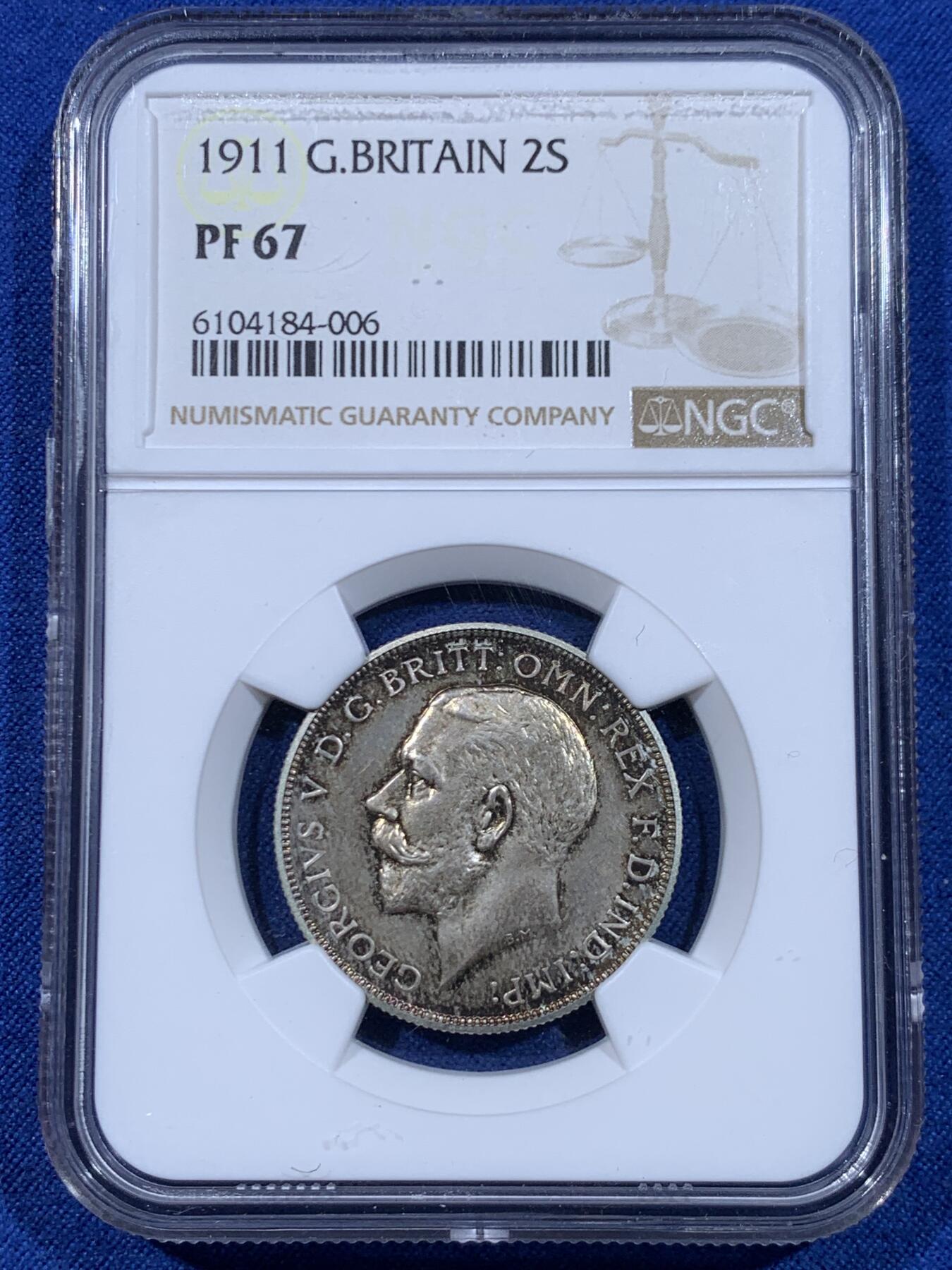 《竞宝斋》第447场 周日，周一，2场连拍 （全场包邮） NGC PF67 英国 1911年 乔治五世精制1弗洛林银币 英系经典品种，镜面效果好，尤其背面，黄绿包浆，少见彩系，非常漂亮