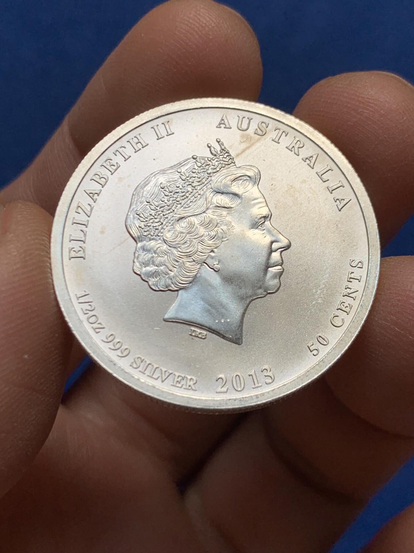 《竞宝斋》第447场 周日，周一，2场连拍 （全场包邮） 澳大利亚2013年“太平洋战争70周年”1/2盎司纪念银币（15.55克 999银）