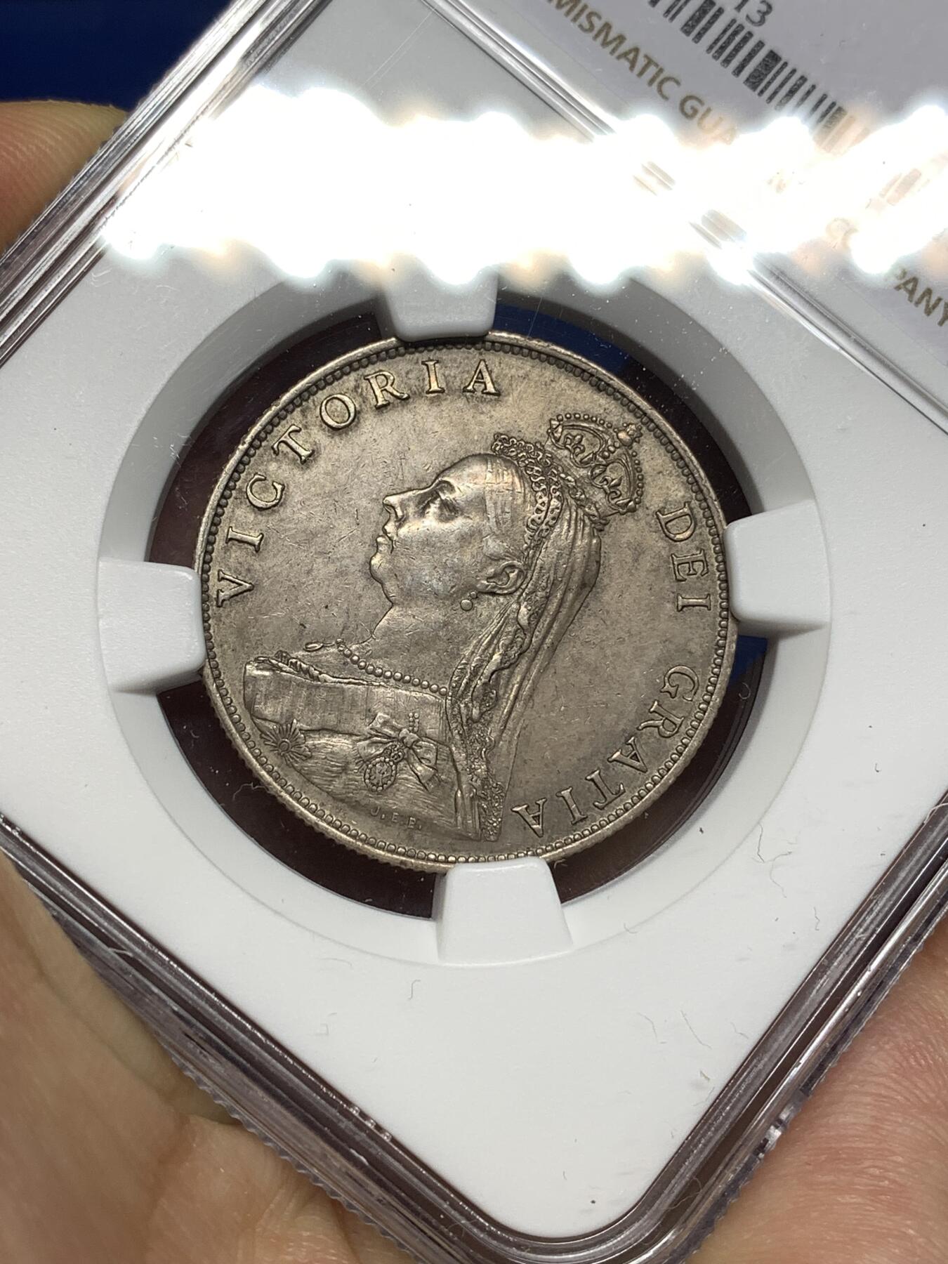 《竞宝斋》第447场 周日，周一，2场连拍 （全场包邮） NGC AU58 英国1887弗洛林银币，经典英伦包浆，略有低评。