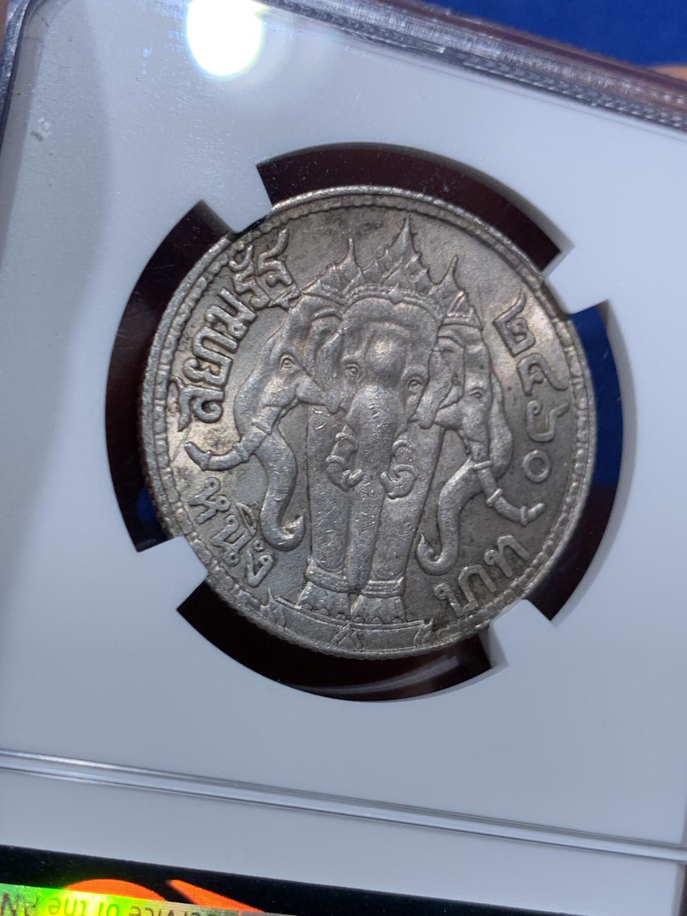 《竞宝斋》第447场 周日，周一，2场连拍 （全场包邮） NGC MS62 泰国1917拉玛六世一泰铢银币，热门品种，包浆温润，转光好品