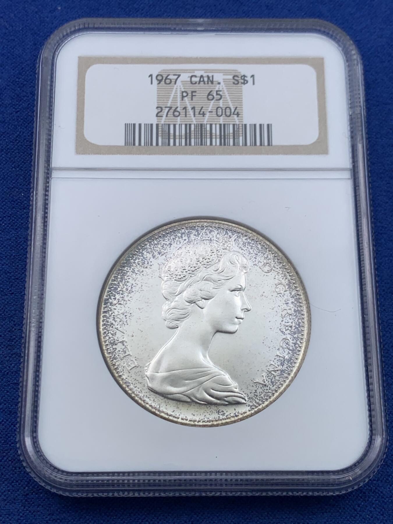 《竞宝斋》第447场 周日，周一，2场连拍 （全场包邮） NGC PF65 加拿大1967年伊丽莎白二世1元大雁银币，正面环彩满天星， NGC老盒子，上手观感更佳