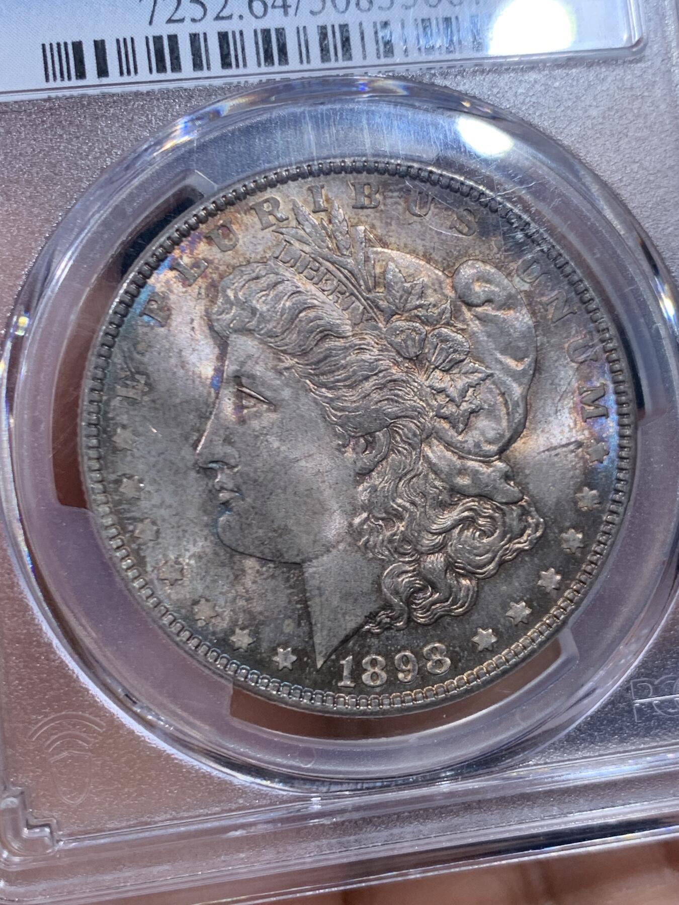 《竞宝斋》第447场 周日，周一，2场连拍 （全场包邮） PCGS MS64 美国 1898年 摩根银币 淡蓝紫色包浆，观感舒适养眼，少见