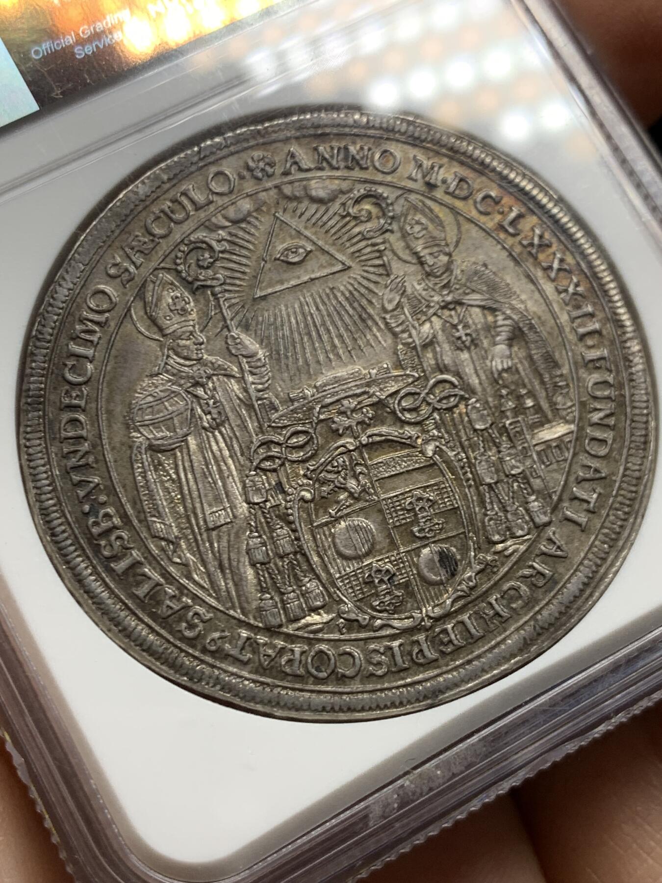《竞宝斋》第447场 周日，周一，2场连拍 （全场包邮） NGC MS63 奥地利萨尔茨堡 1682年 主教区建立1100年泰勒大银币 光度极好 细节精美 稀少品种 包浆自然 老币最合适的状态