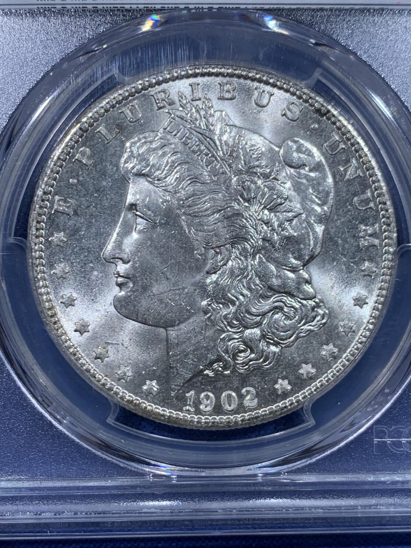 《竞宝斋》第447场 周日，周一，2场连拍 （全场包邮） PCGS MS64 美国1902年O版摩根一美元银币 早期标签 转光漂亮 支撑小磕 细节见图