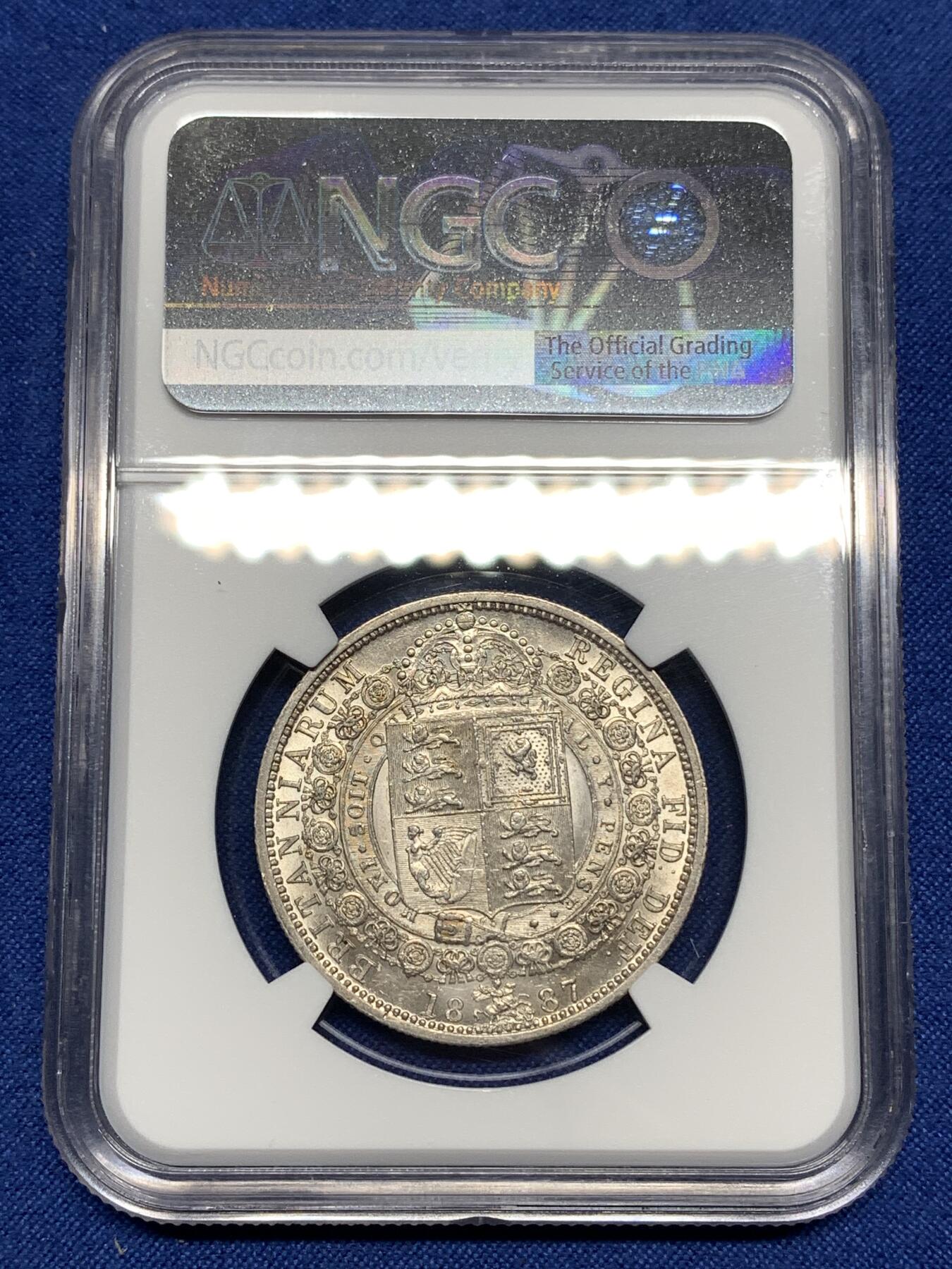 《竞宝斋》第447场 周日，周一，2场连拍 （全场包邮） NGC AU55 英国1887年半克朗银币，背面银光充沛，细节不错。