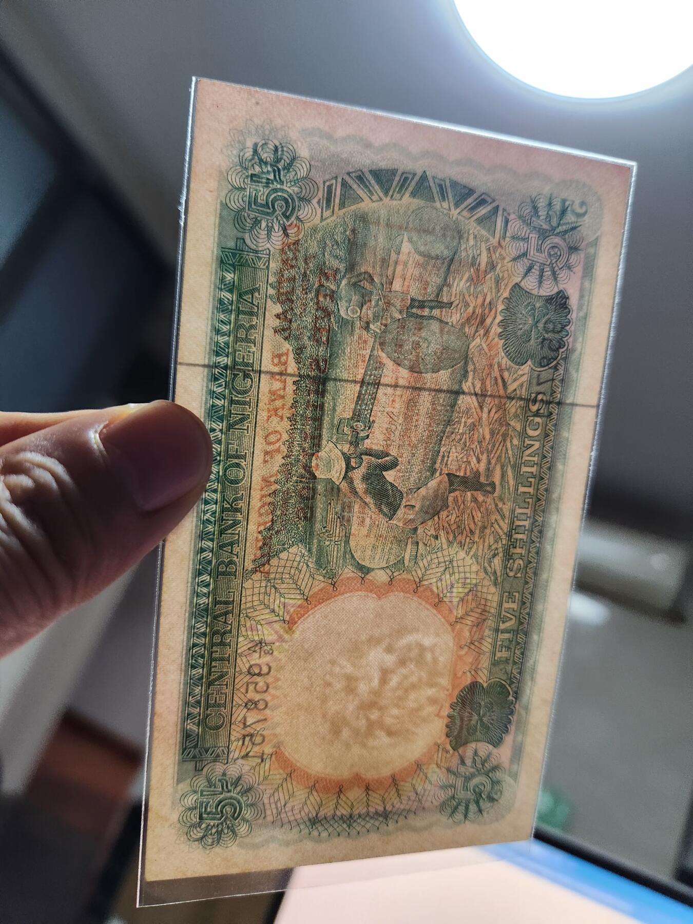 12月13号晚上8点 外国纸币自动截拍第72场 尼日利亚 1968年5先令  近新 稀少早期英镑制