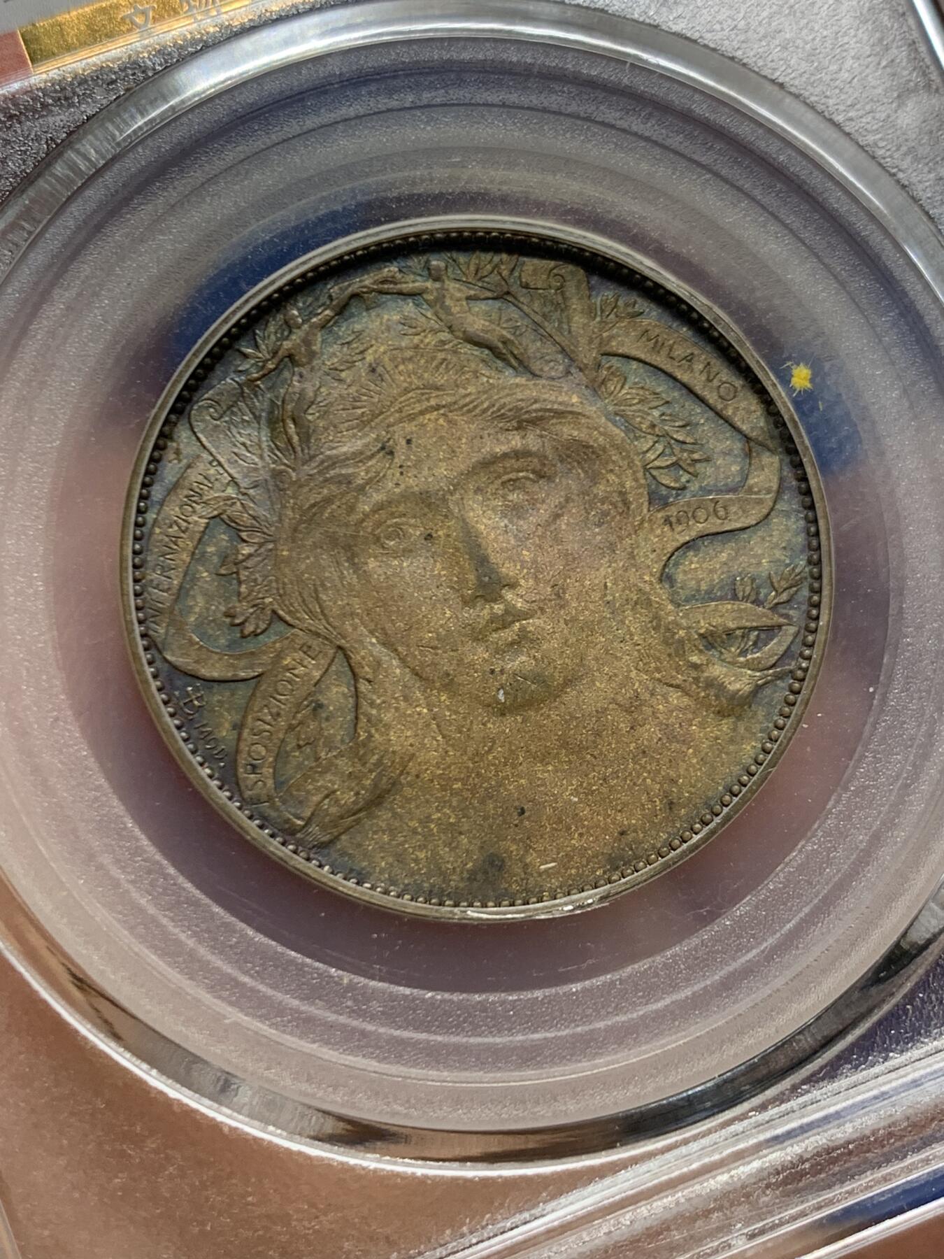 《竞宝斋》第447场 周日，周一，2场连拍 （全场包邮） 公博 AU53 意大利 1906年 米兰世博会 20分 代用铜币 正面为古罗马智慧女神密涅瓦（即雅典娜） 非常经典的品种 细节良好