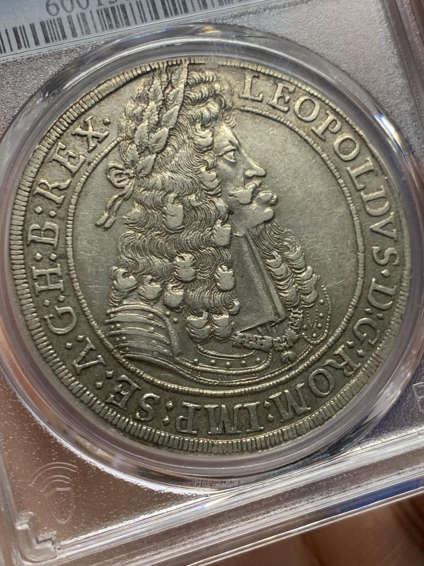 《竞宝斋》第447场 周日，周一，2场连拍 （全场包邮） PCGS AU55 奥地利帝国蒂罗尔州1704/3年骑字版利奥波德一世泰勒大银币 哈尔厂铸造 不多见的品种 大披发地包天造型 值得入手